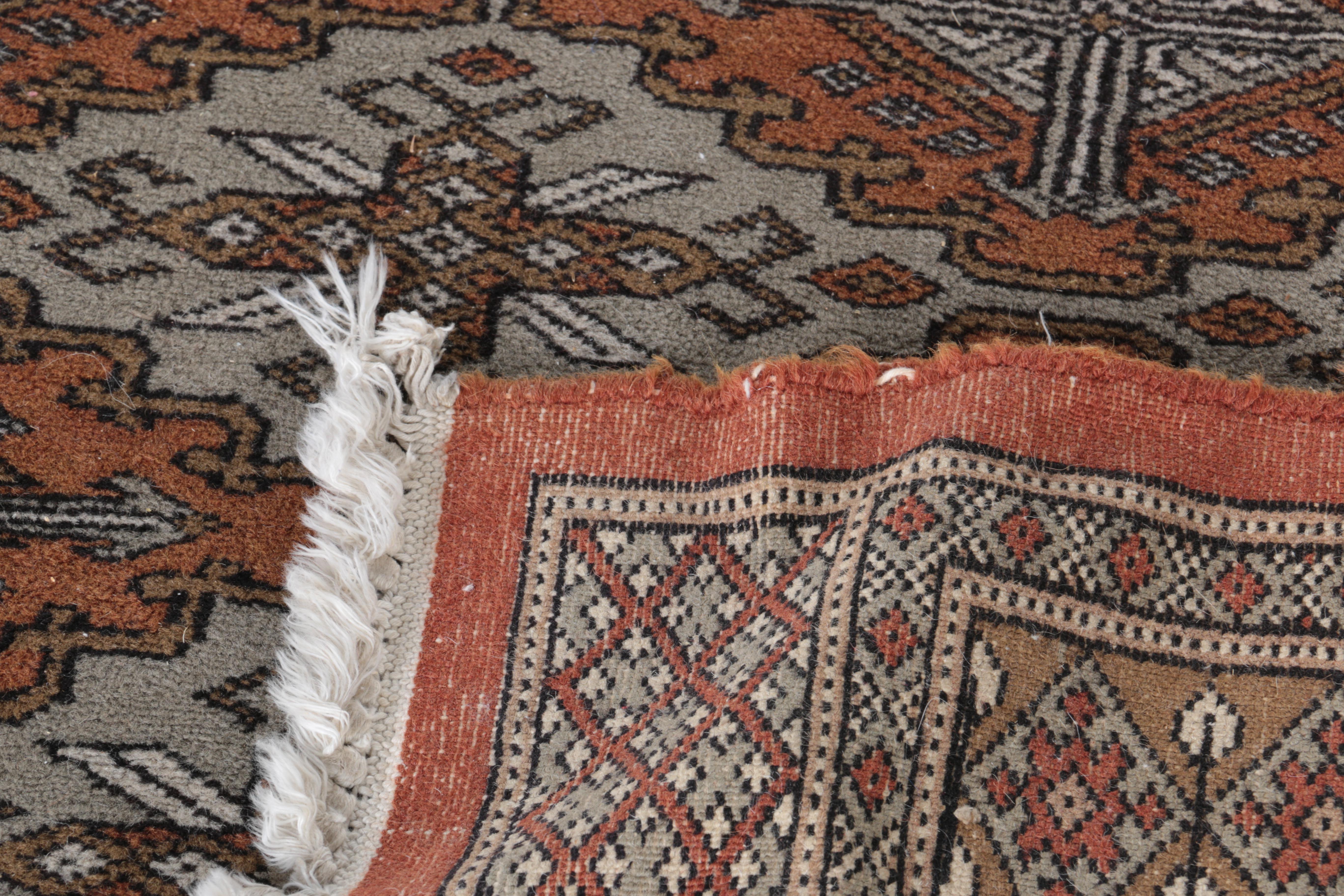 Hand-Knotted Bokhara Area Rug