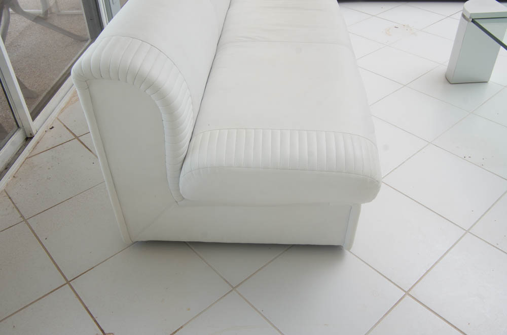White Leatherette L-Shaped Sectional Sofa With Ottoman