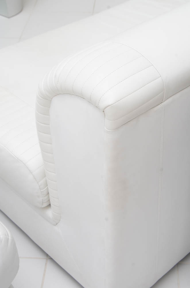 White Leatherette L-Shaped Sectional Sofa With Ottoman