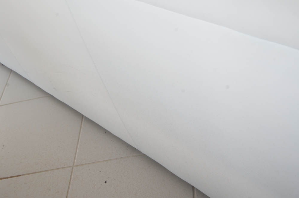 White Leatherette L-Shaped Sectional Sofa With Ottoman