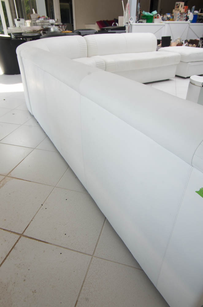 White Leatherette L-Shaped Sectional Sofa With Ottoman