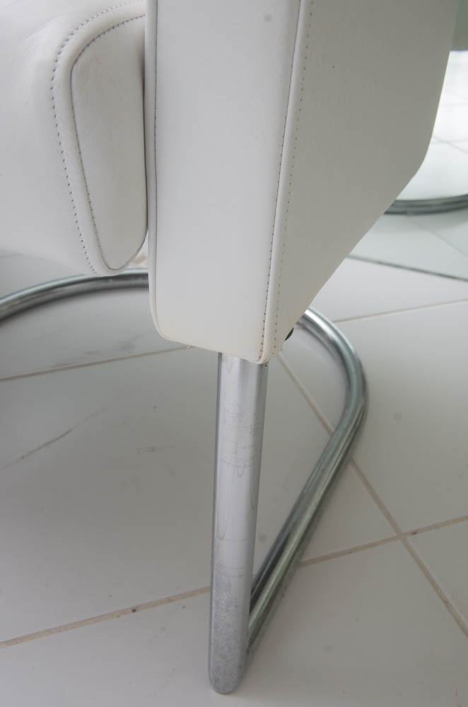 Two Modern White Leather Armchairs with Silver Toned Frames