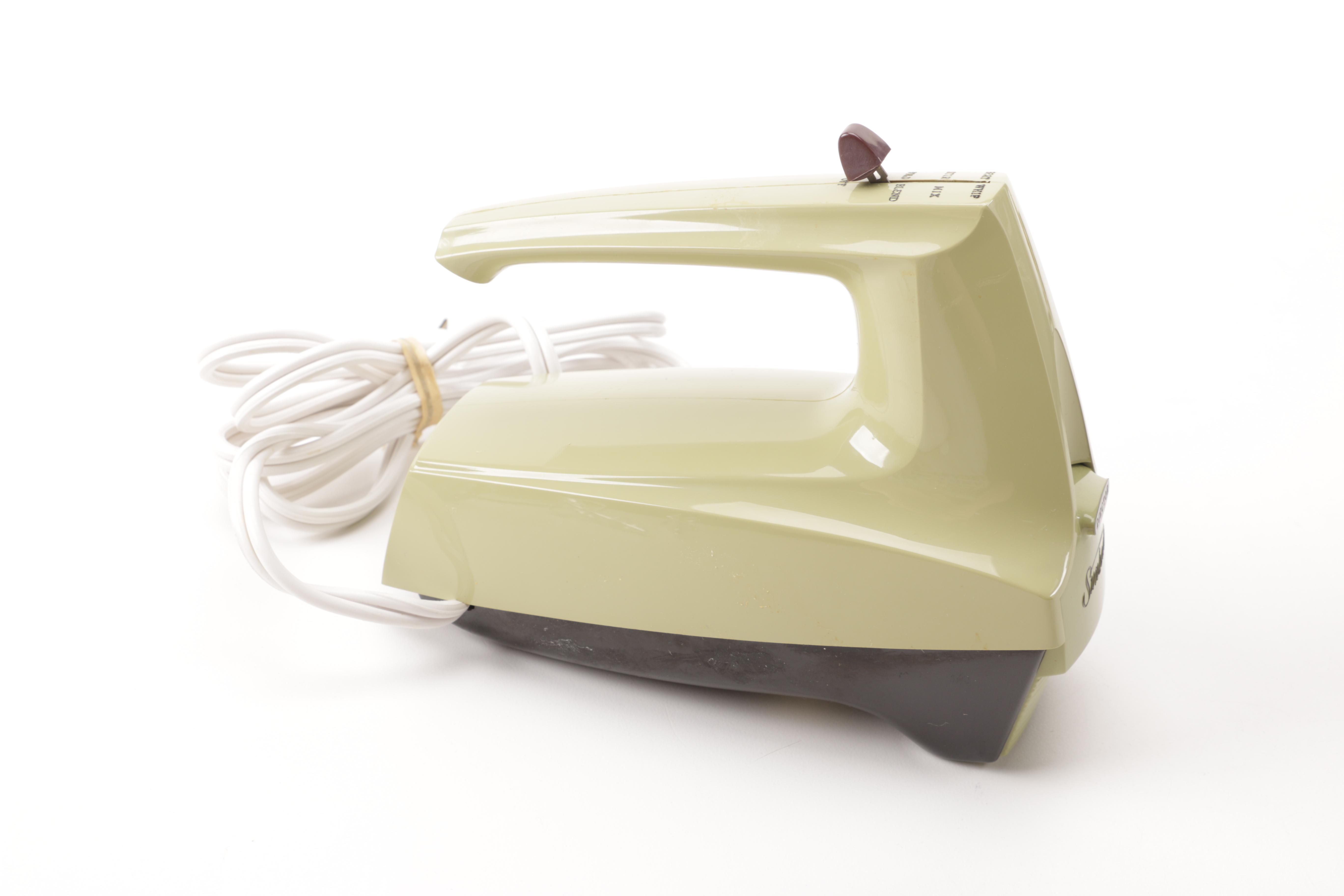 A Gevalia Coffeemaker, A Hamilton Beach Can Opener and a Sunbeam Hand Mixer