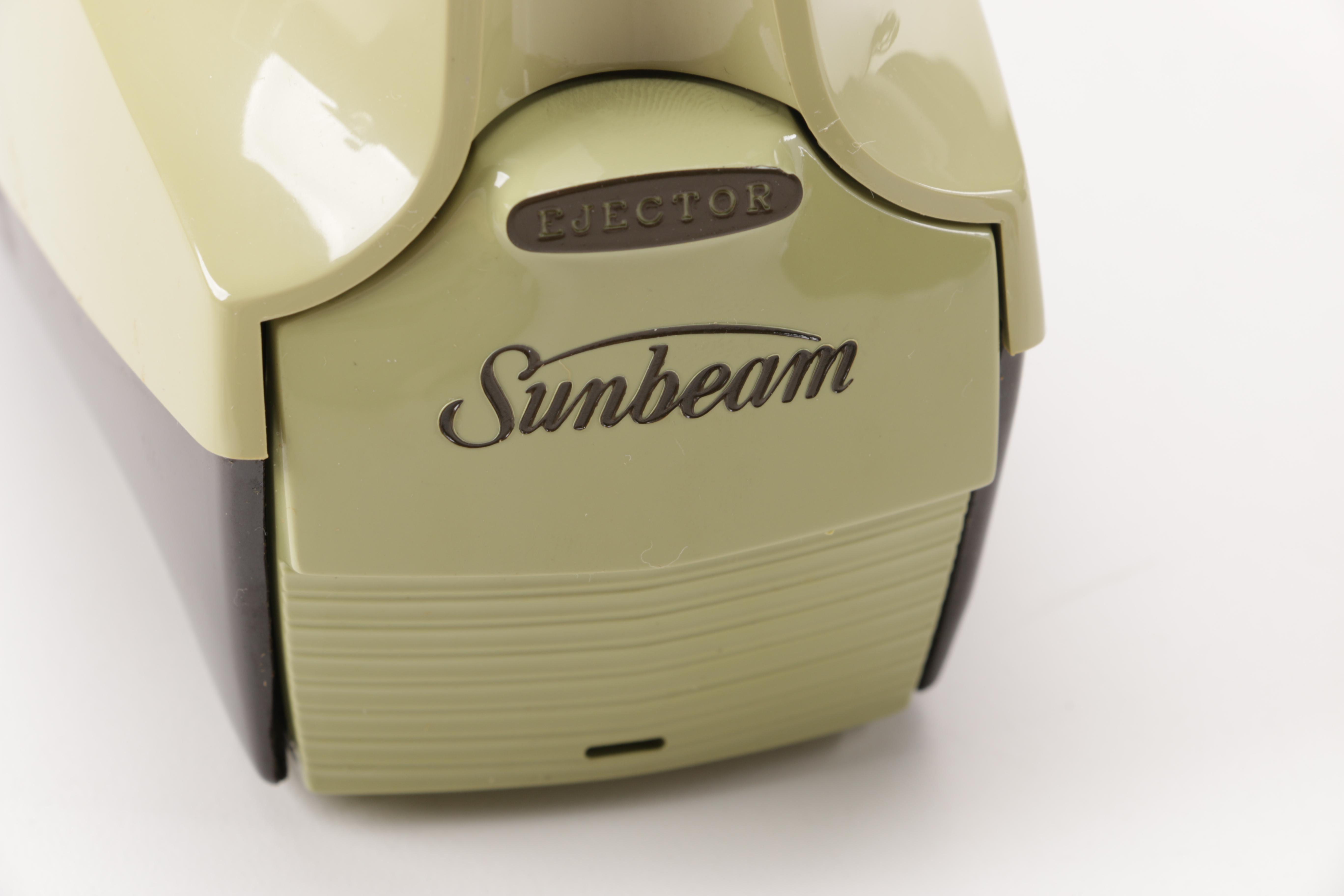 A Gevalia Coffeemaker, A Hamilton Beach Can Opener and a Sunbeam Hand Mixer