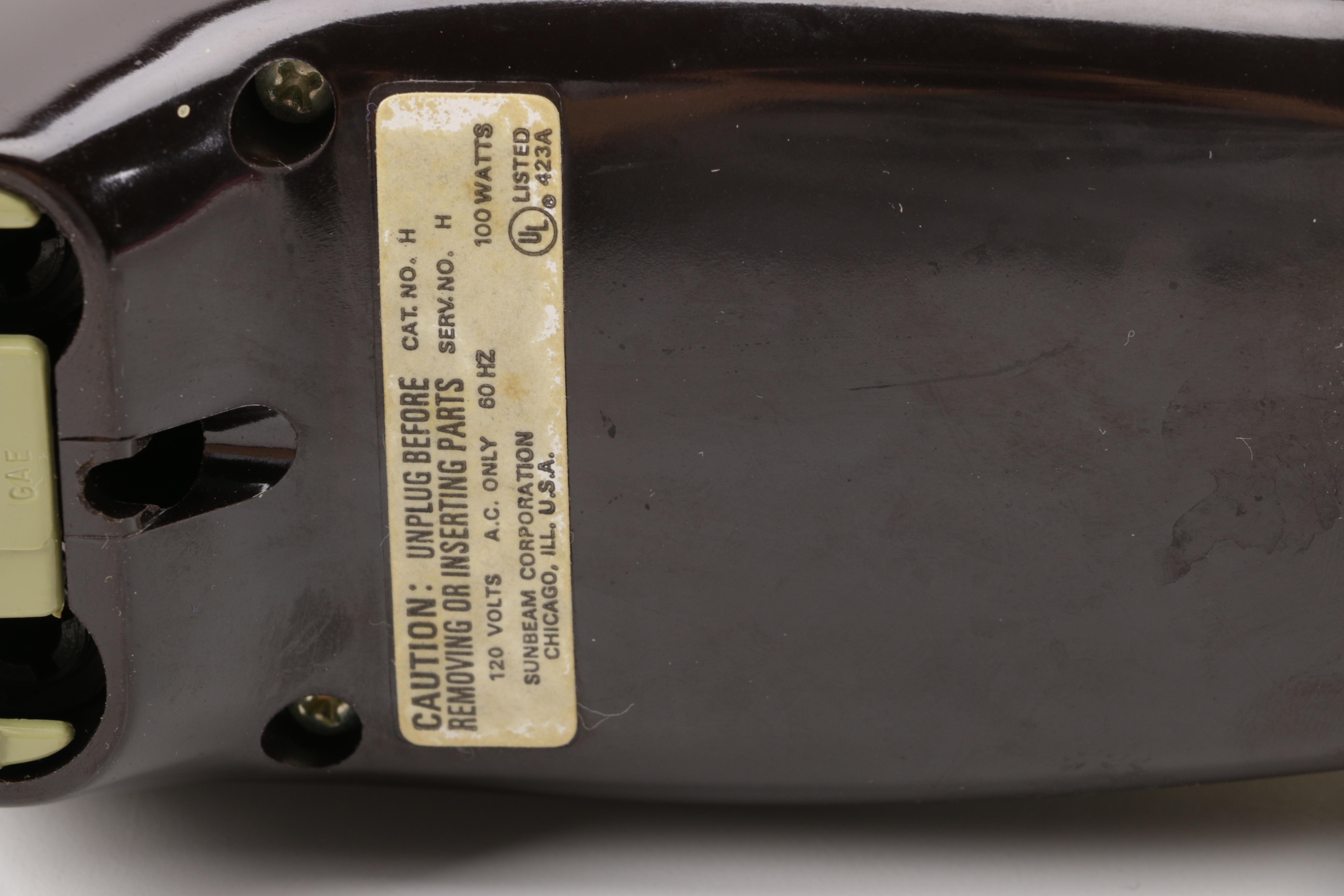 A Gevalia Coffeemaker, A Hamilton Beach Can Opener and a Sunbeam Hand Mixer