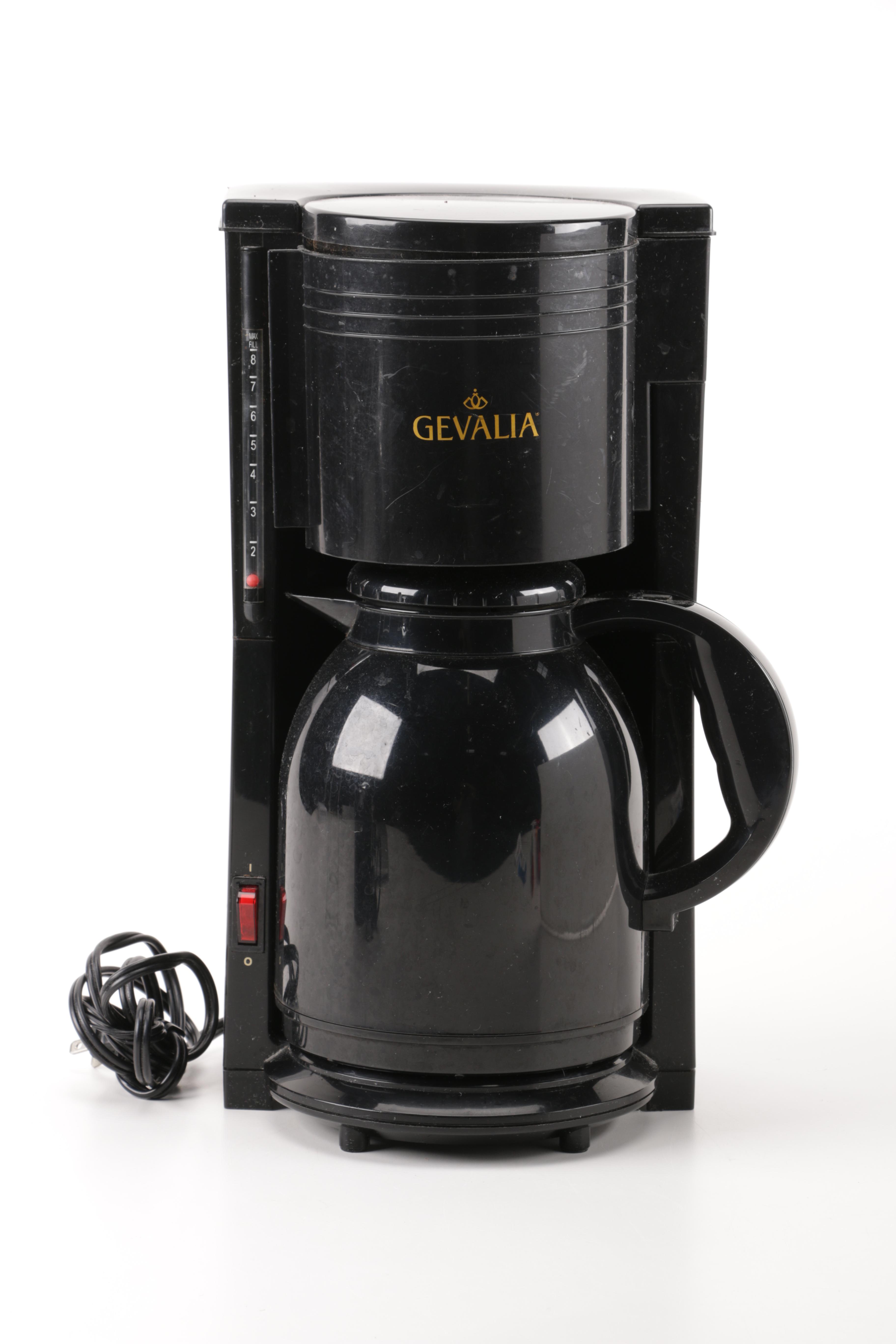 A Gevalia Coffeemaker, A Hamilton Beach Can Opener and a Sunbeam Hand Mixer