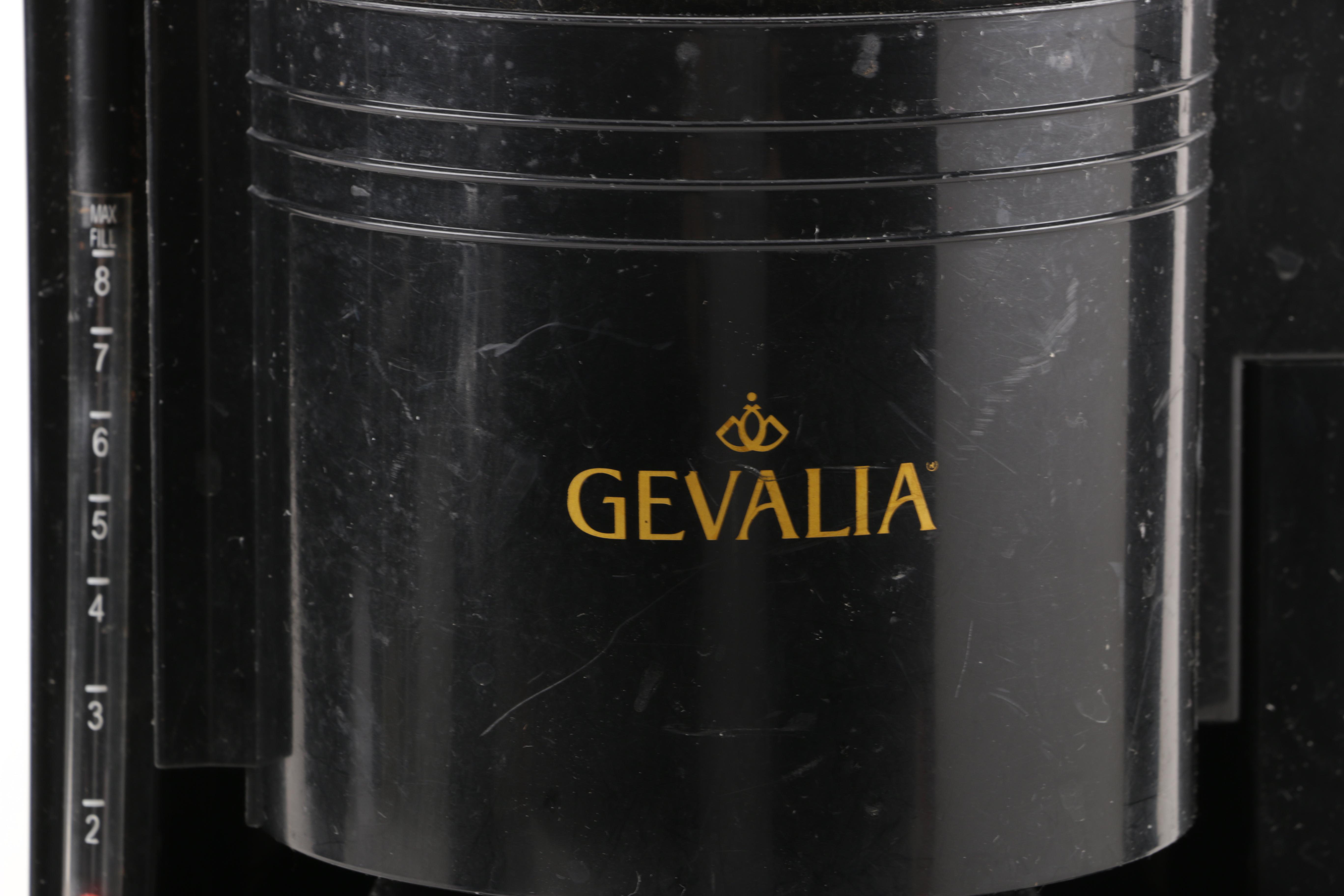 A Gevalia Coffeemaker, A Hamilton Beach Can Opener and a Sunbeam Hand Mixer