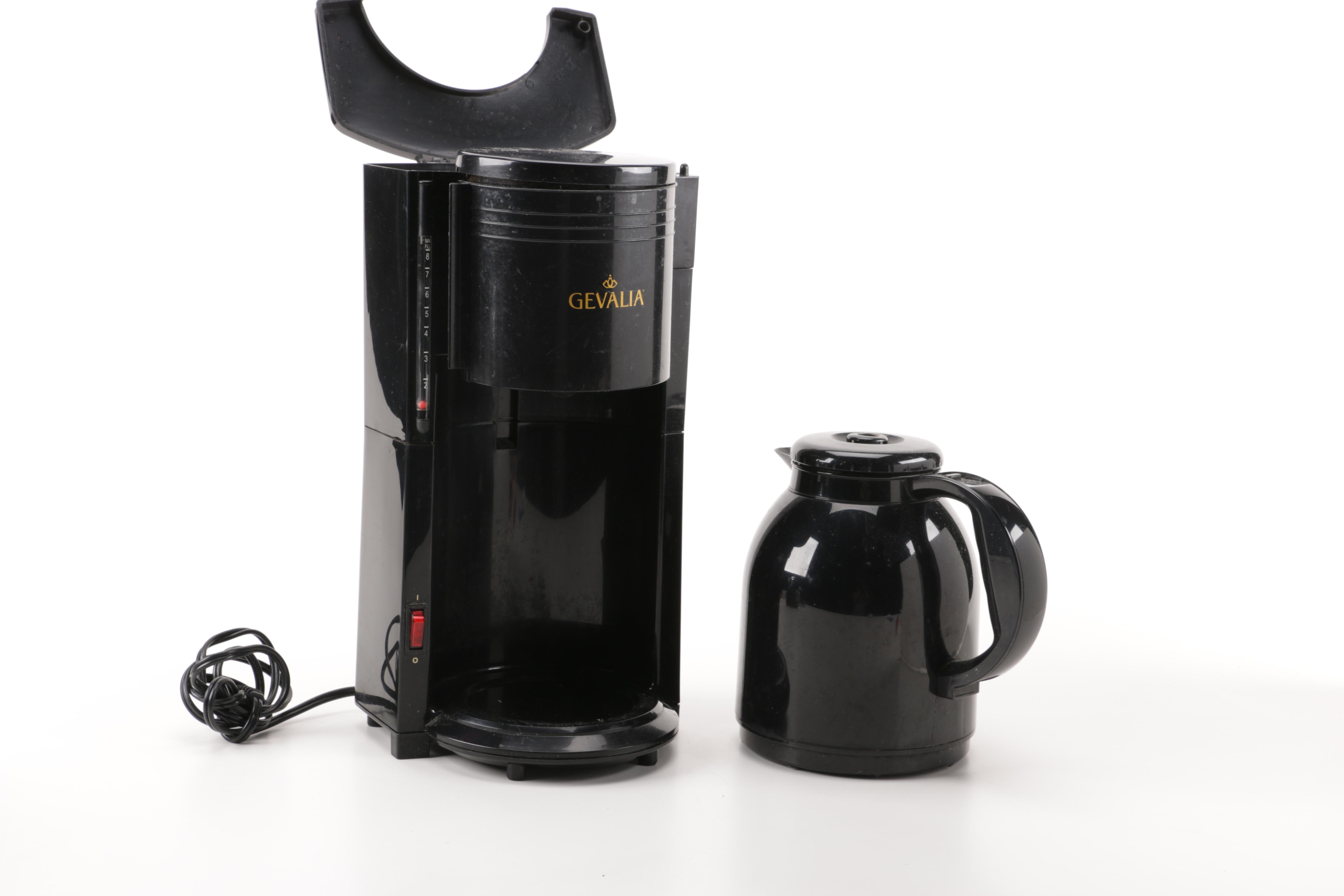 A Gevalia Coffeemaker, A Hamilton Beach Can Opener and a Sunbeam Hand Mixer