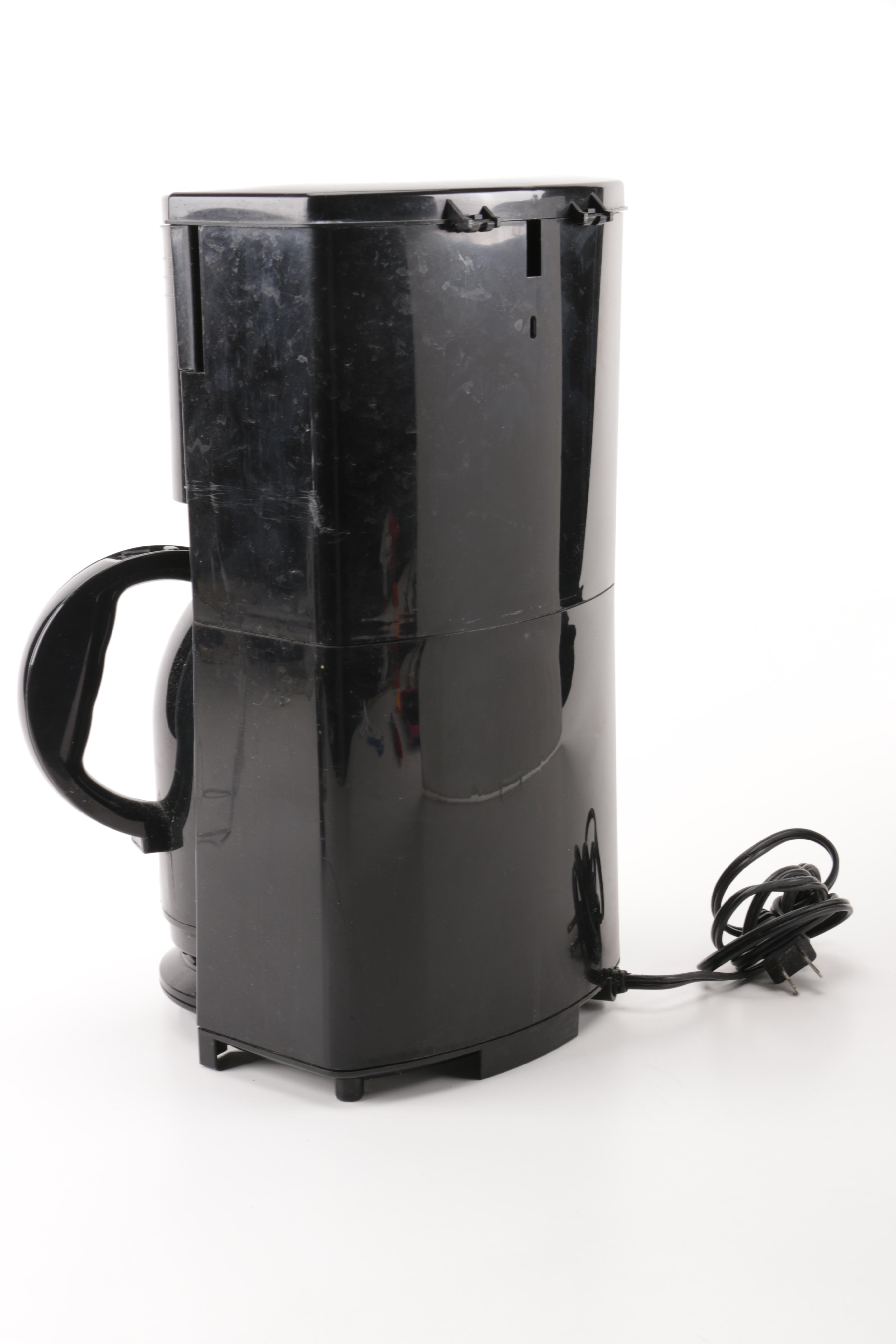 A Gevalia Coffeemaker, A Hamilton Beach Can Opener and a Sunbeam Hand Mixer