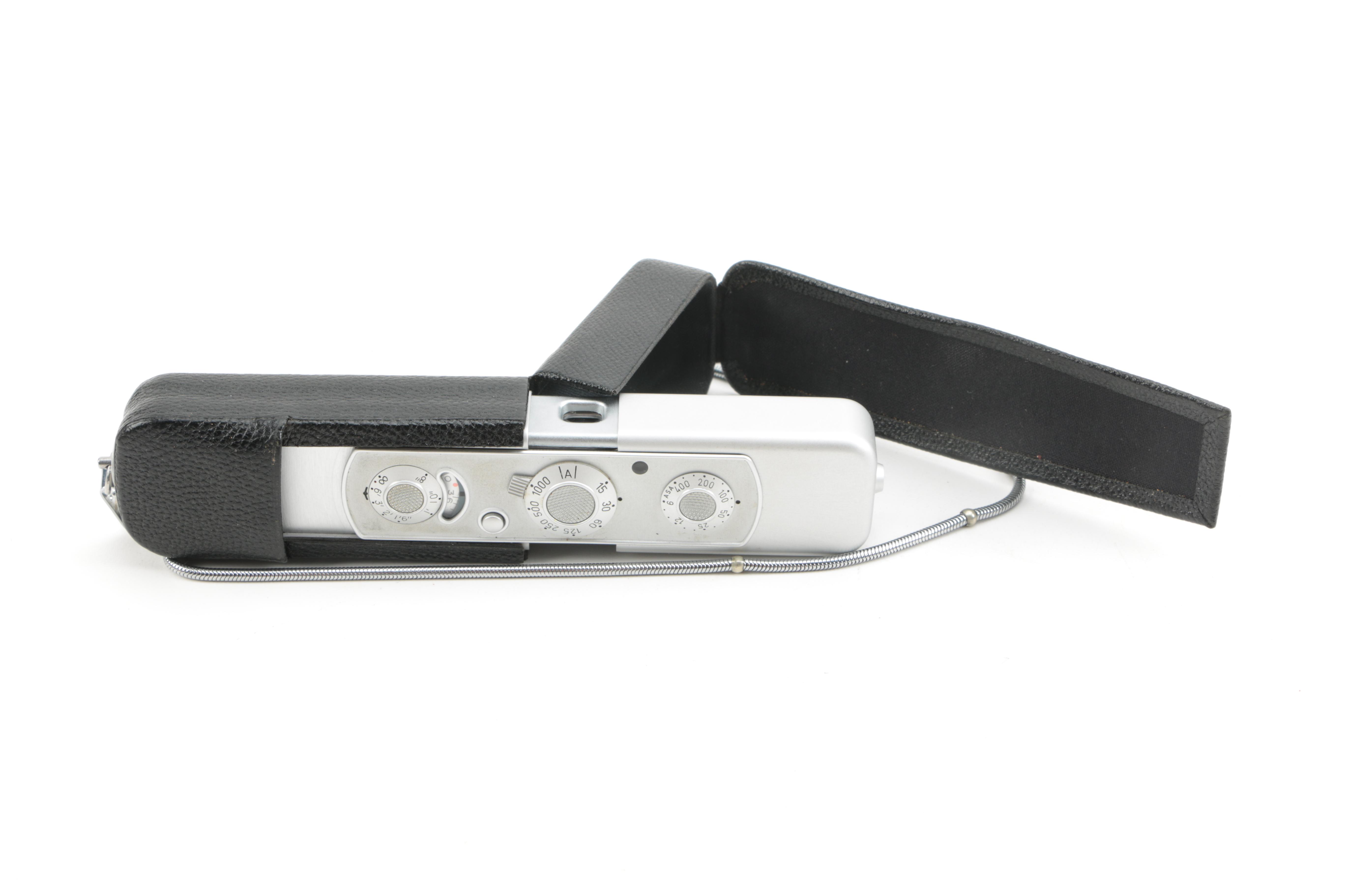 Canon, Pentax and  Minox Cameras With Accessories