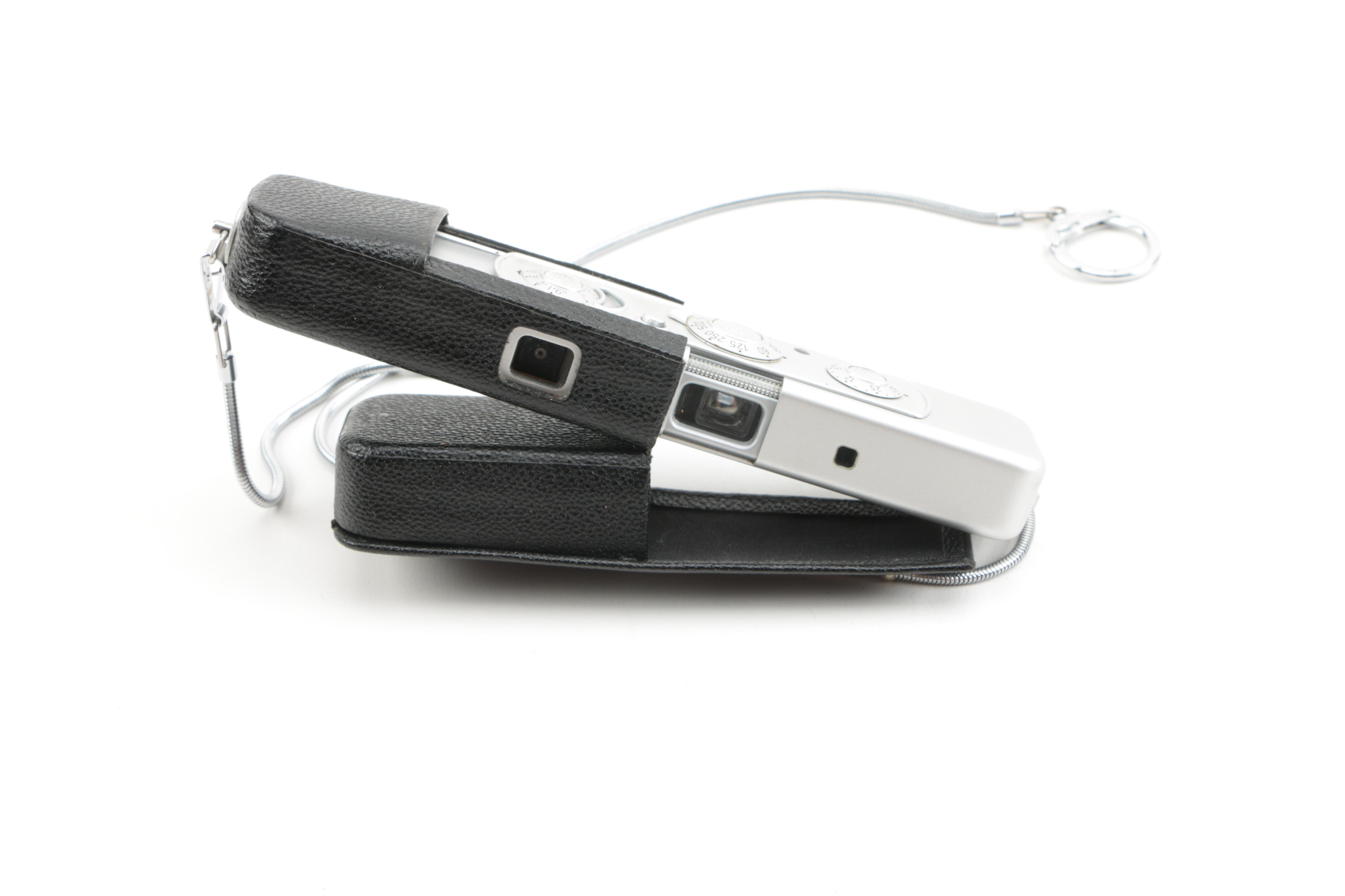 Canon, Pentax and  Minox Cameras With Accessories