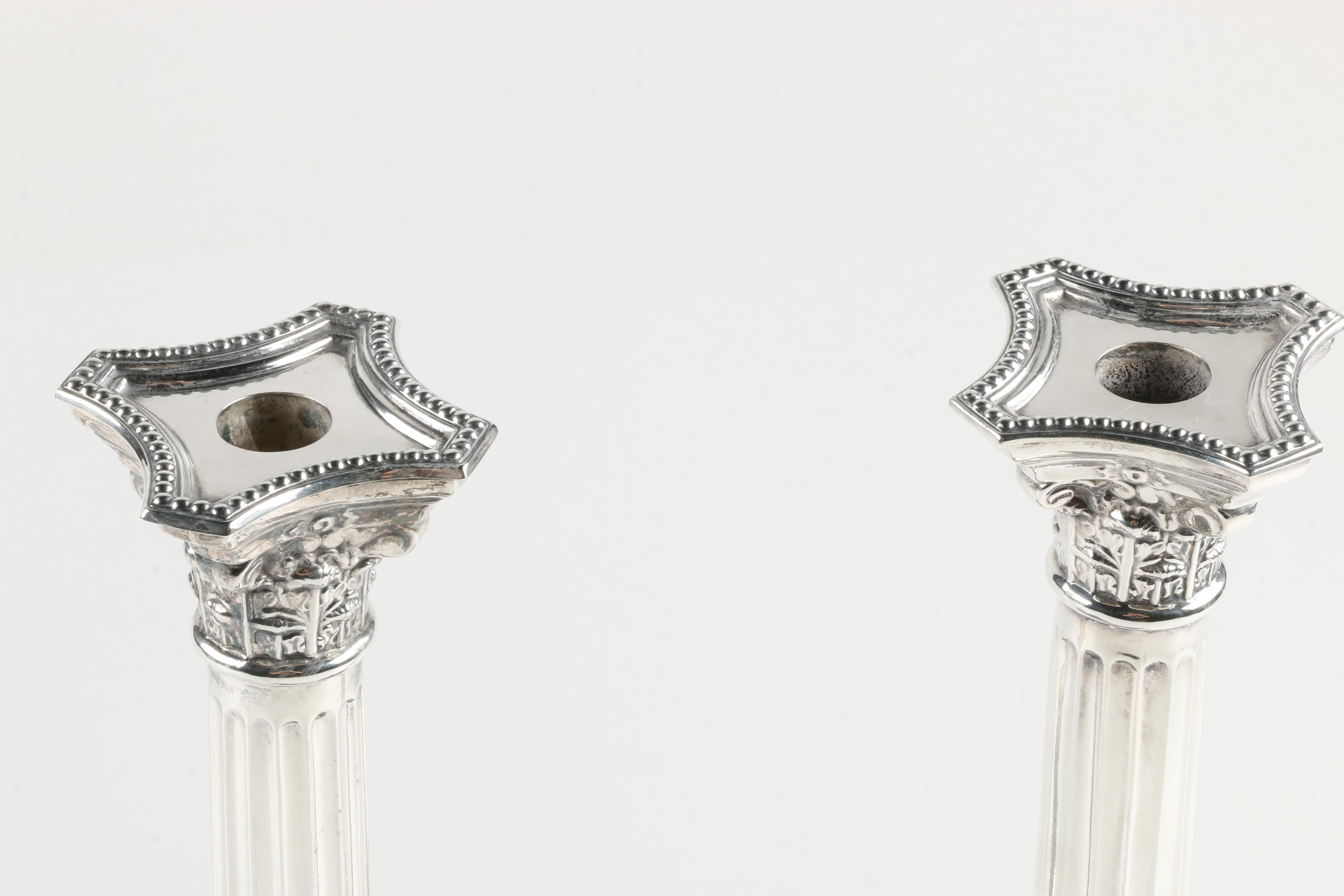 Pair of Bert Gordon Weighted Sterling Silver Candleholders