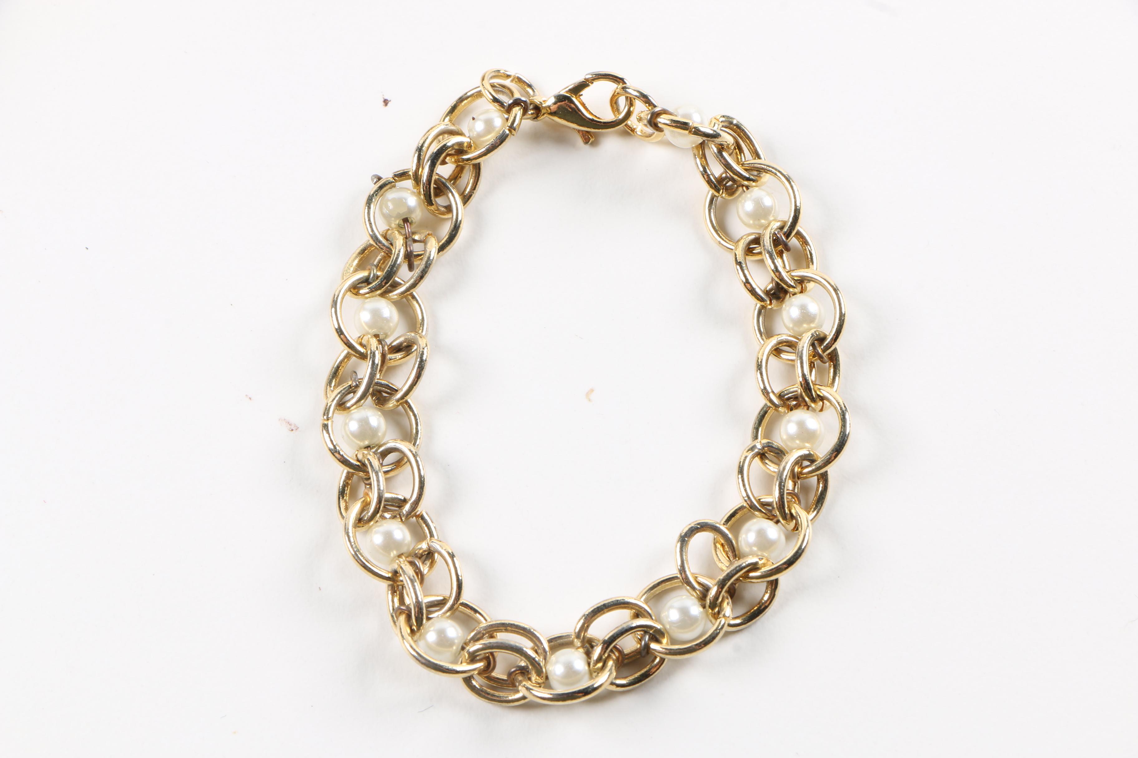 Collection of Silver and Gold Tone Bracelets