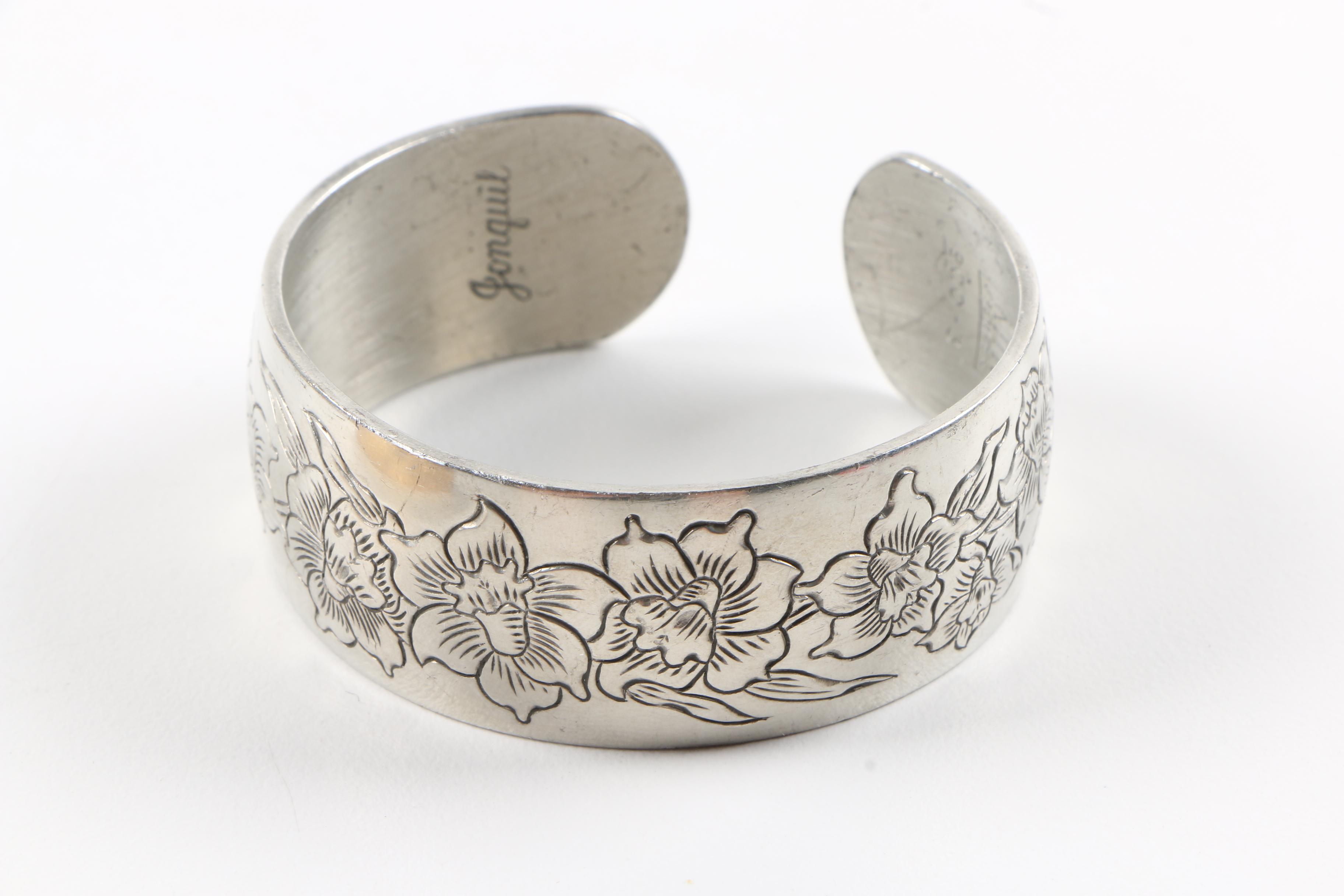 Collection of Silver and Gold Tone Bracelets