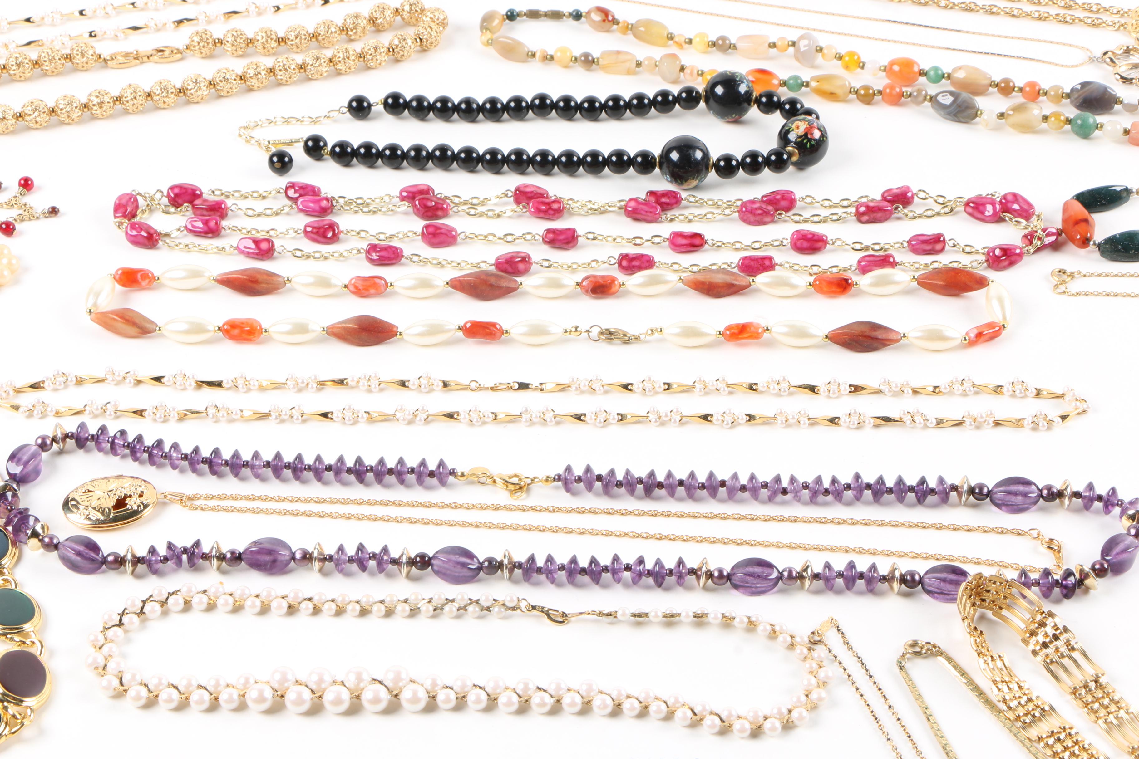 Generous Assortment of Costume Jewelry Including Faux Pearl Necklaces