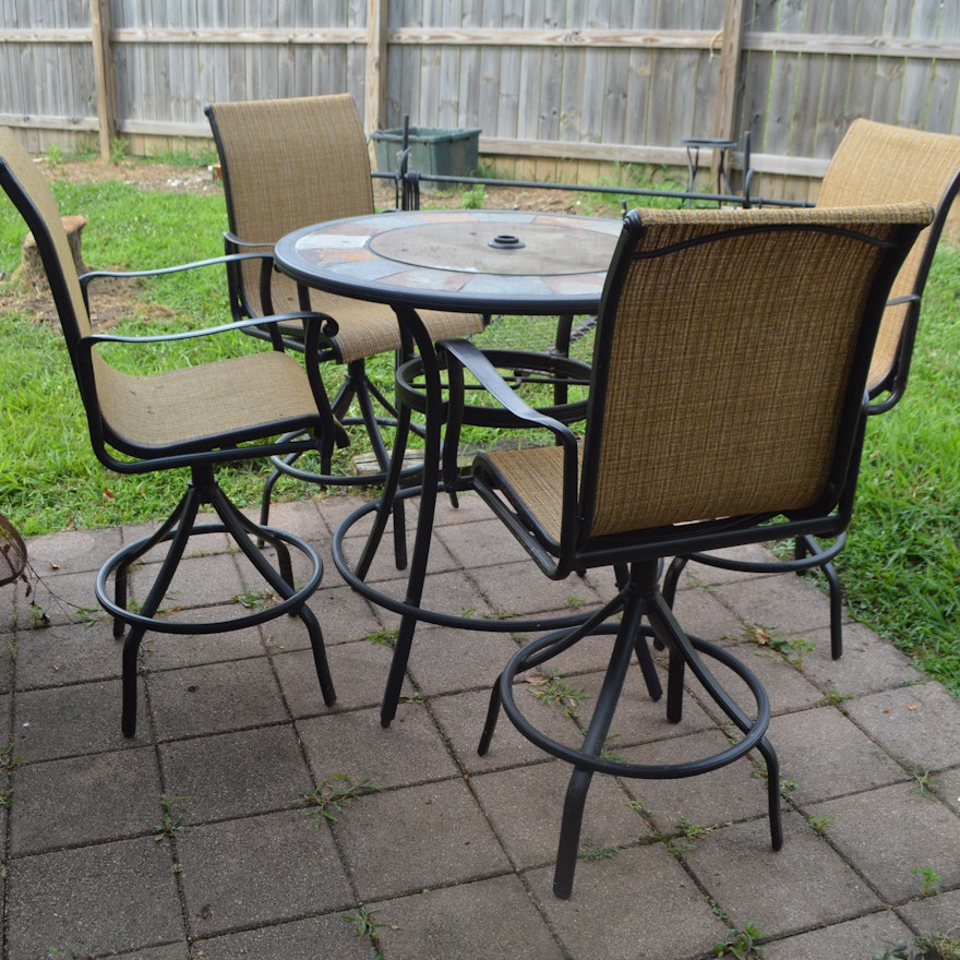 High Top Patio Table and Four Swiveling Armchairs