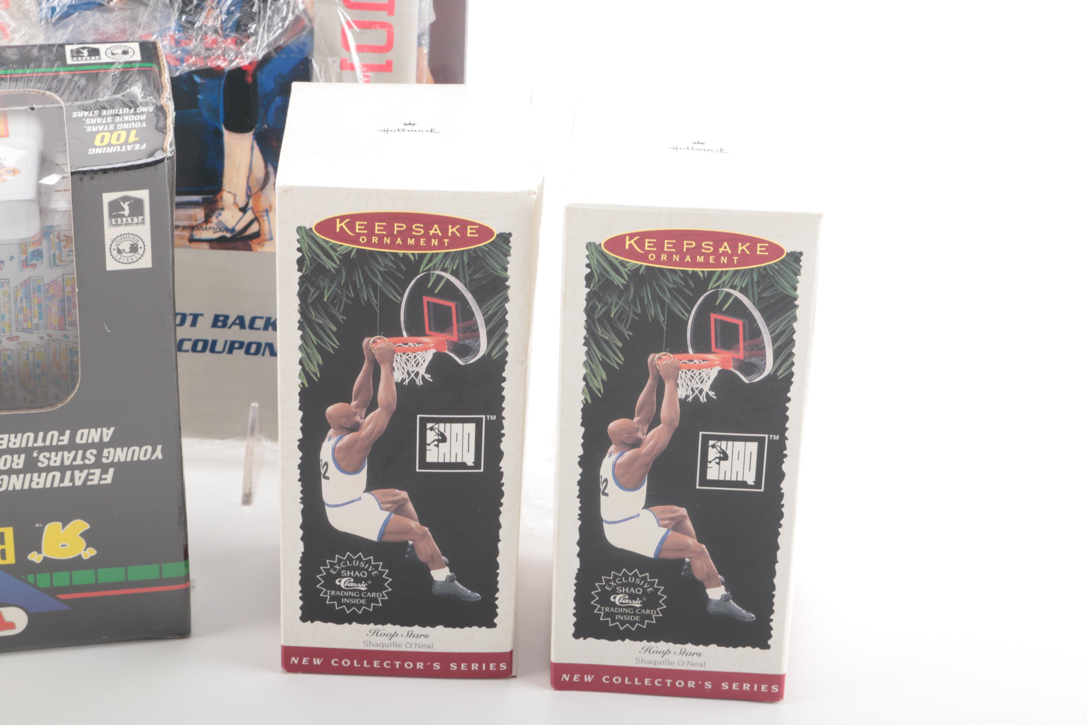 Collection of Hallmark _Keepsake Ornaments_ of Sports Greats and Other Memorabila