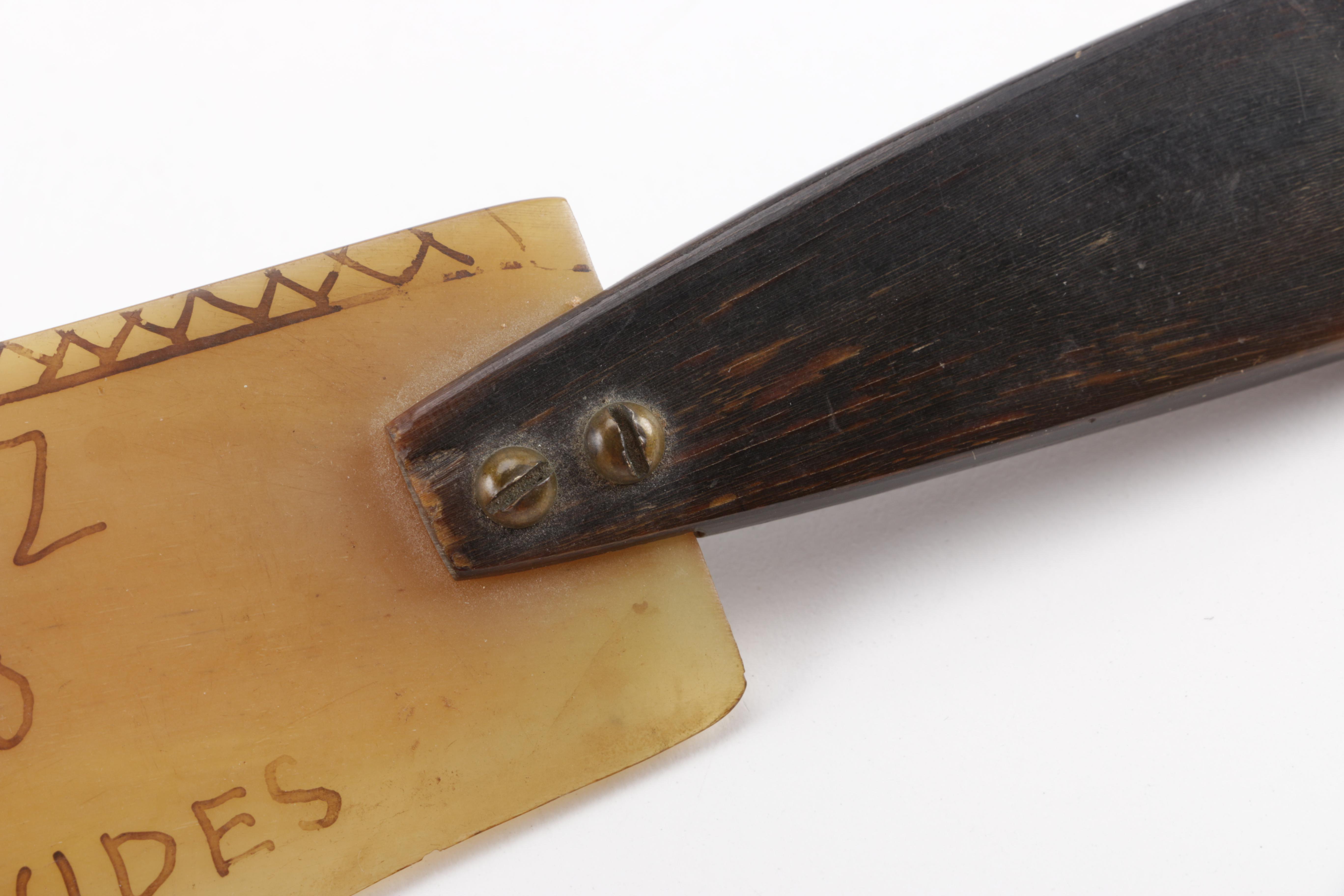 Knife With Horn Blade