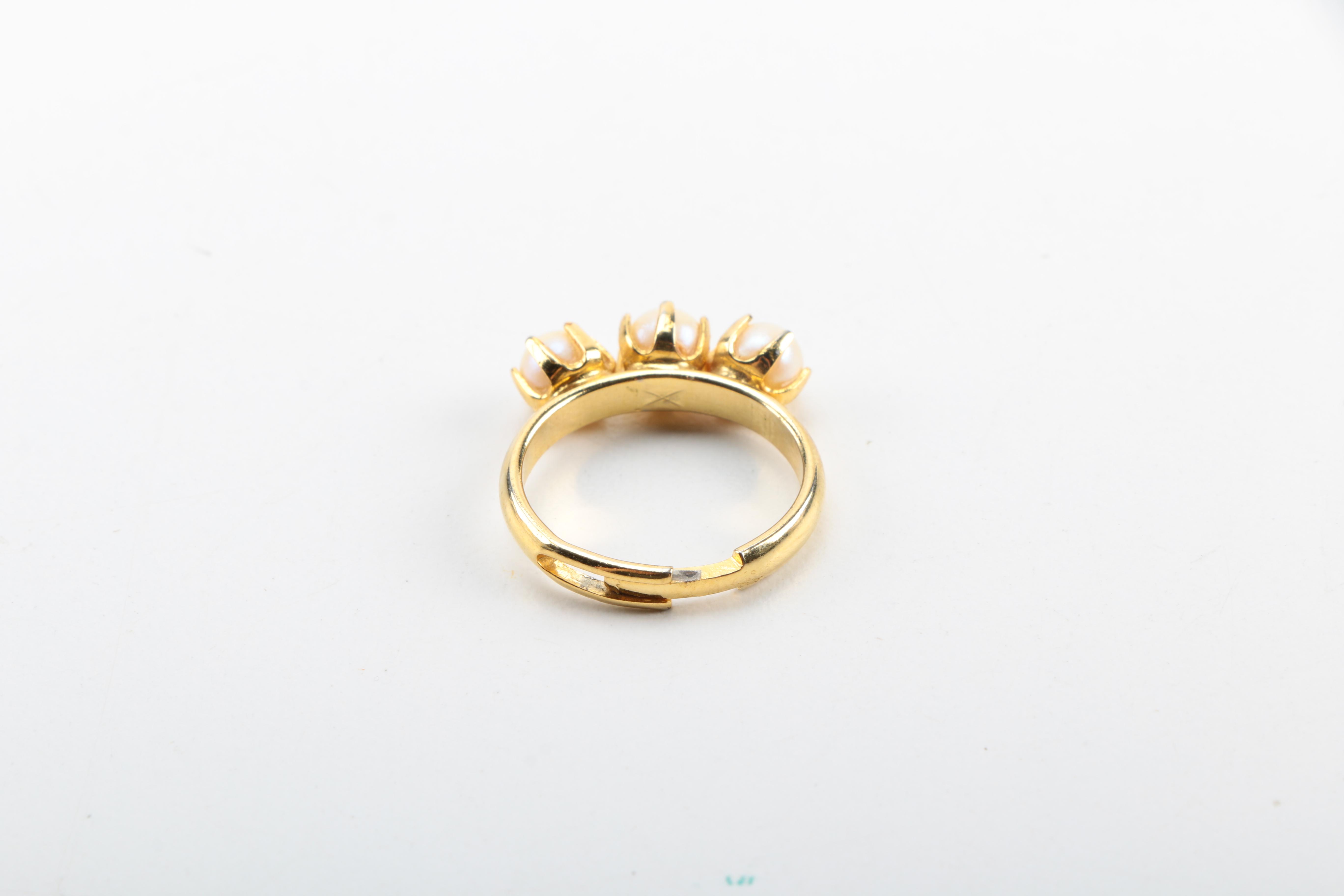 Vintage Trifari Brooch and Three Gold Tone Rings