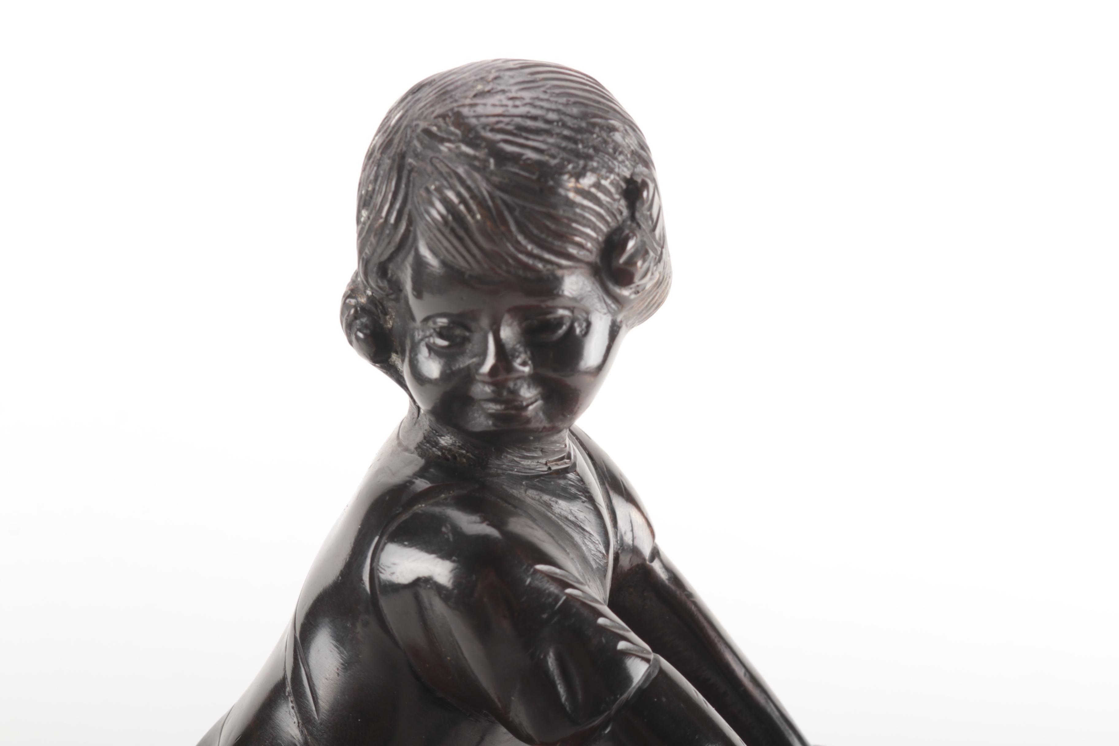 Ceramic Figurine and Wooden Stool