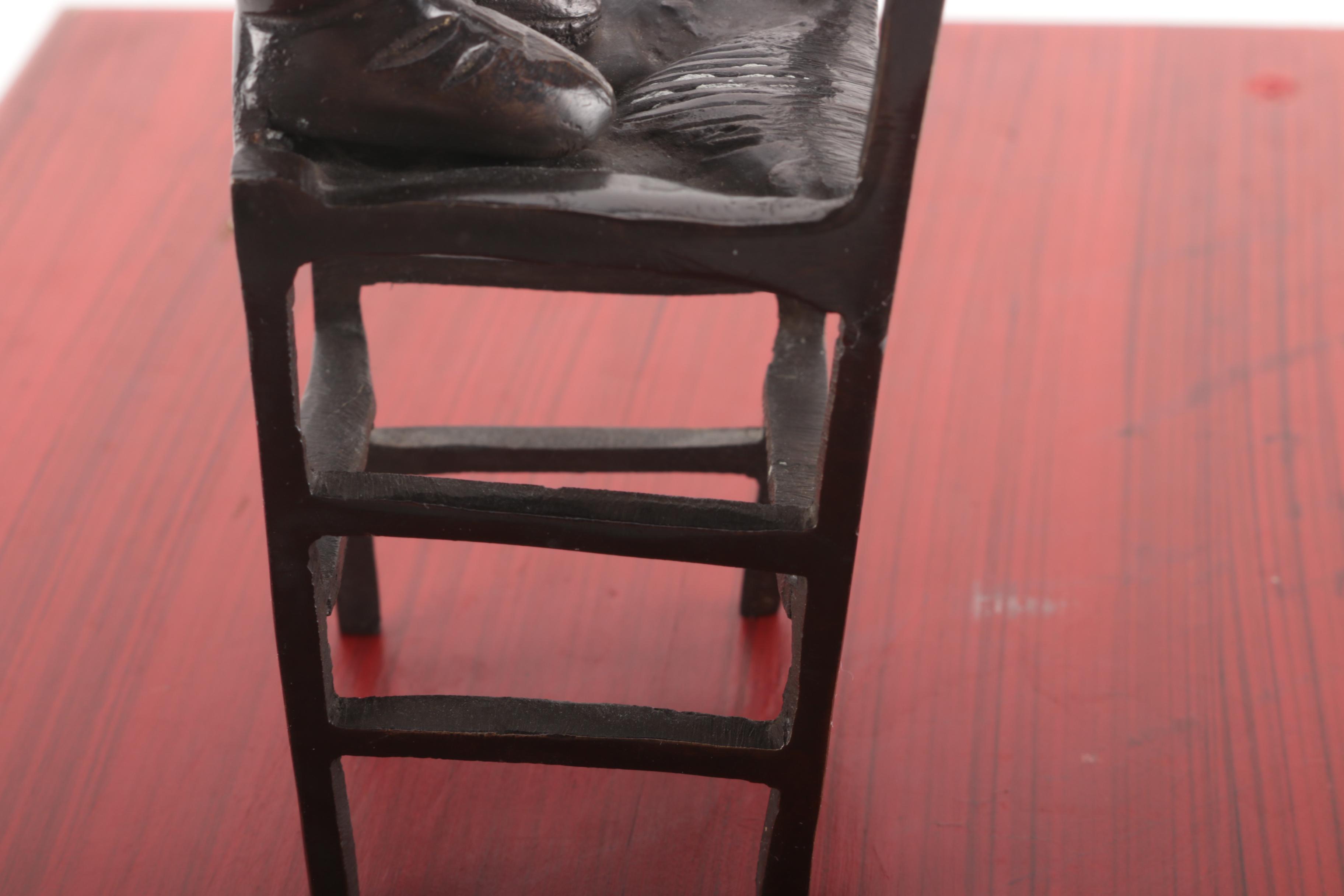 Ceramic Figurine and Wooden Stool