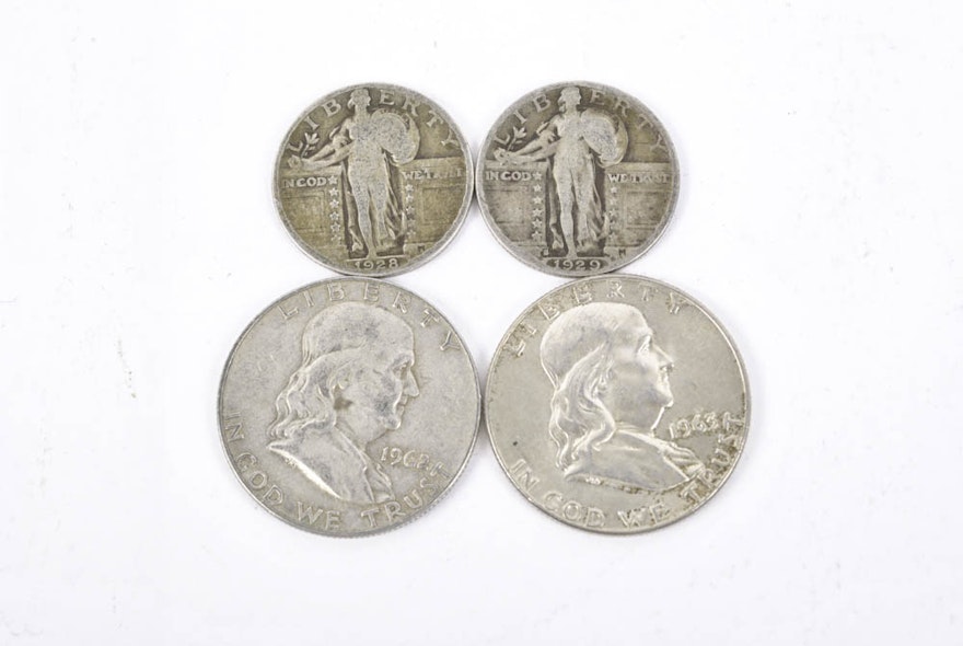 Two Franklin Half Dollars with Two Standing Liberty Quarters