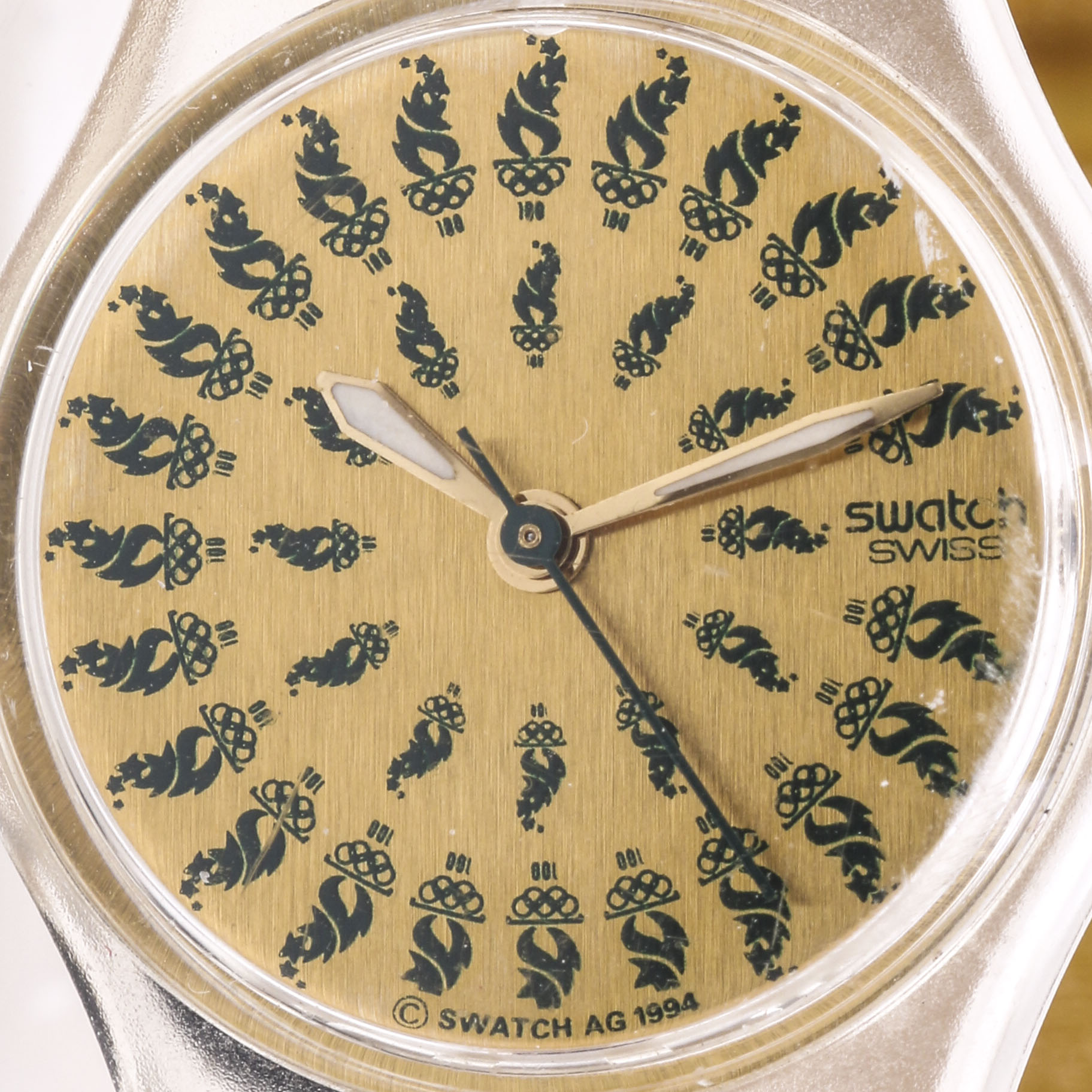 Olympic Torches and Swatch Swiss Plastic Watches