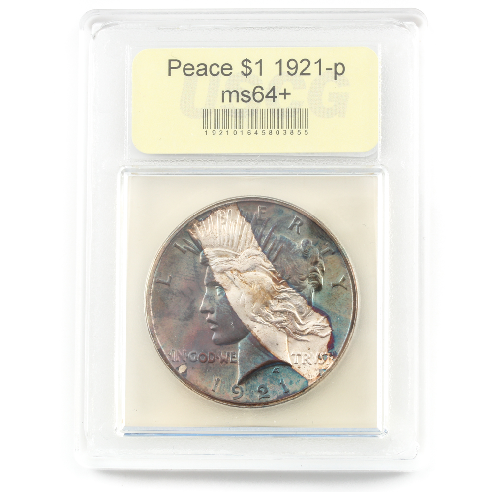 Encapsulated 1921 Peace Silver Dollar with Rainbow Toning