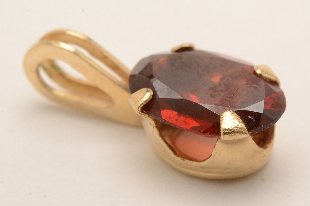 14K Yellow Gold Garnet and Emerald Pendants