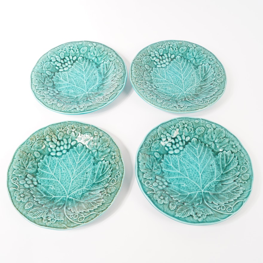 Four Green Majolica Plates