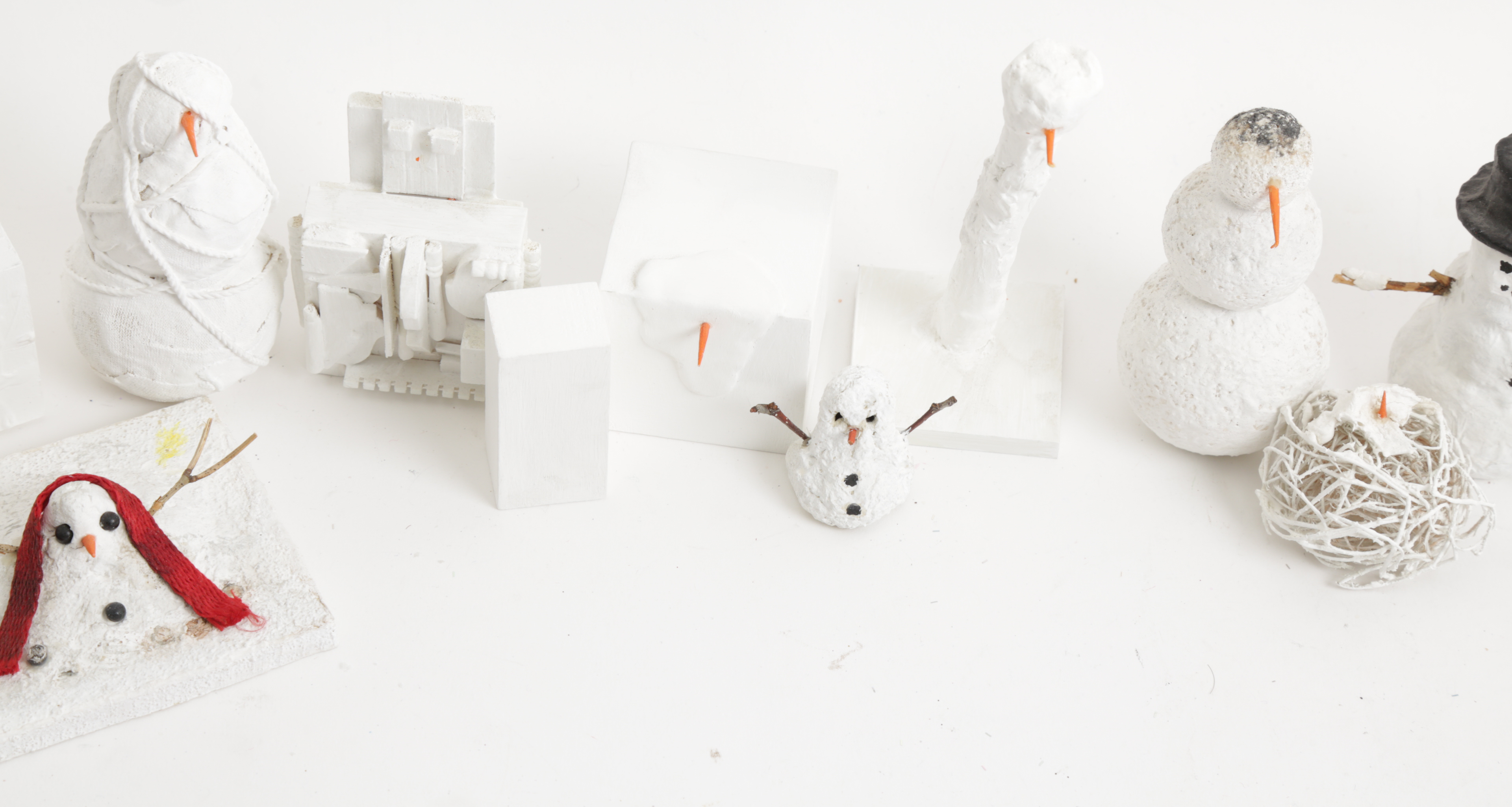 Collection of Abstract Snowman Figurines
