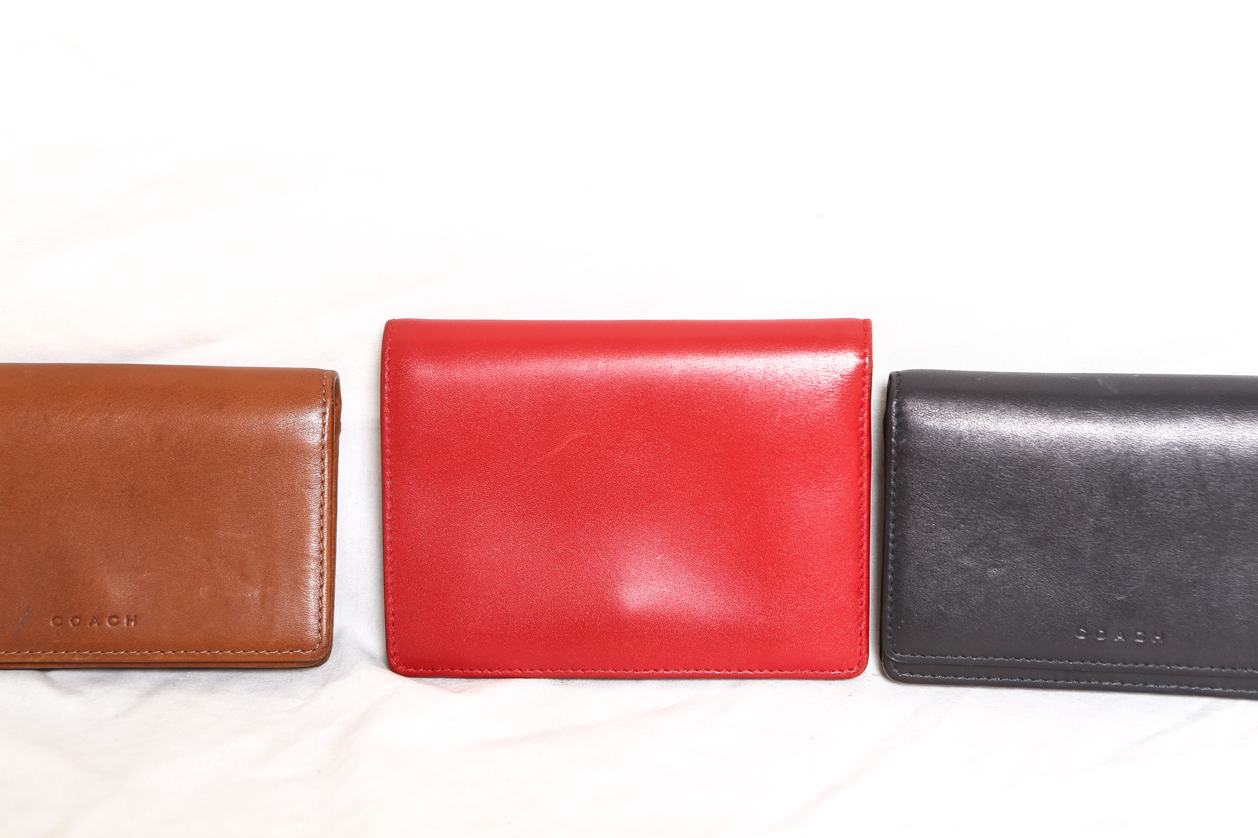 Three Coach Wallets