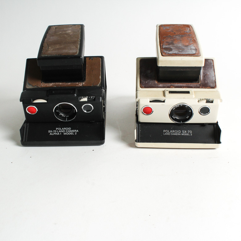 Pair of Vintage Polaroid SX-70 Cameras