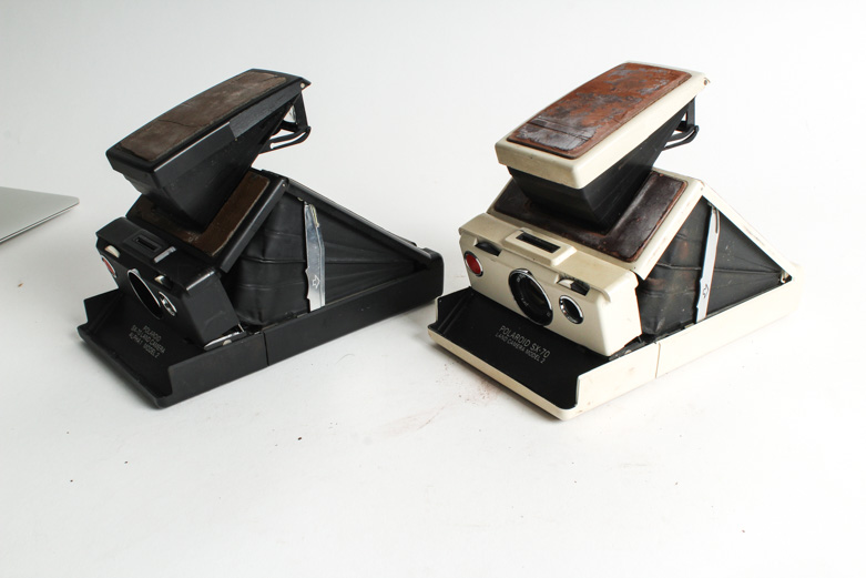 Pair of Vintage Polaroid SX-70 Cameras
