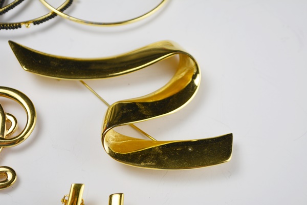 Costume Gold and Black Toned Jewelry With Bookmark