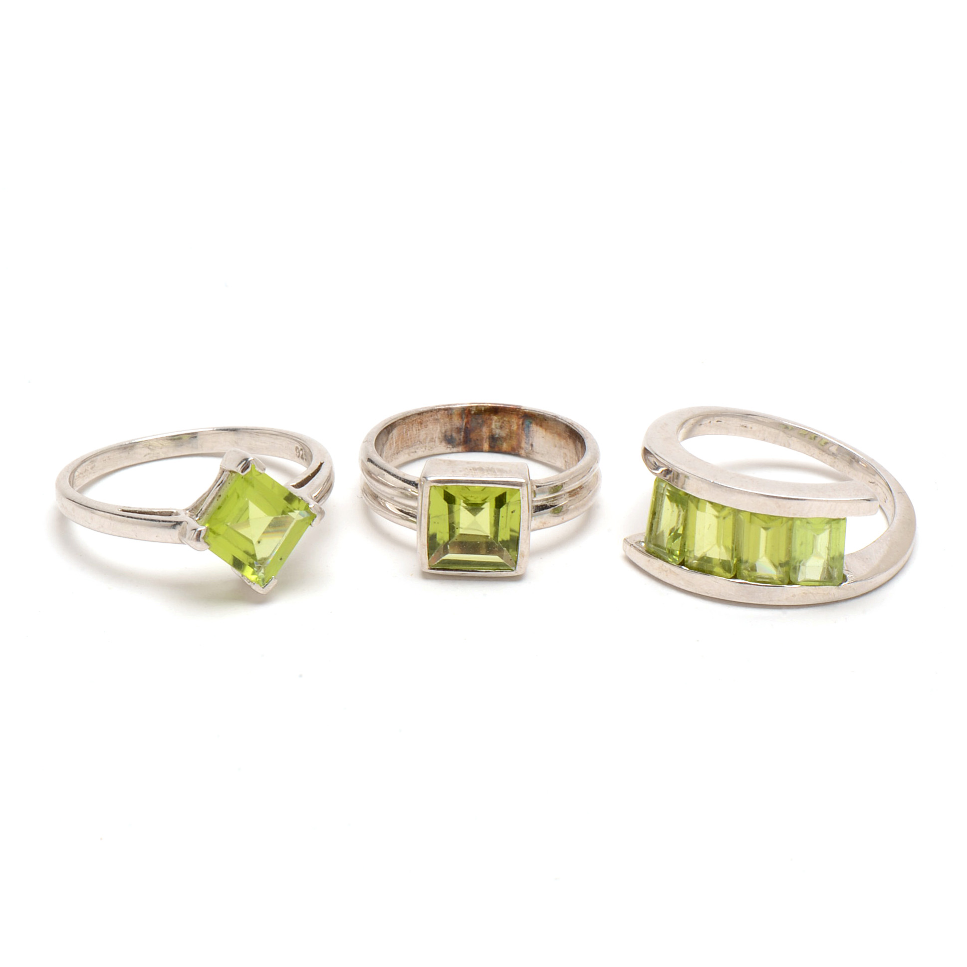 Three Contemporary Sterling Peridot Rings