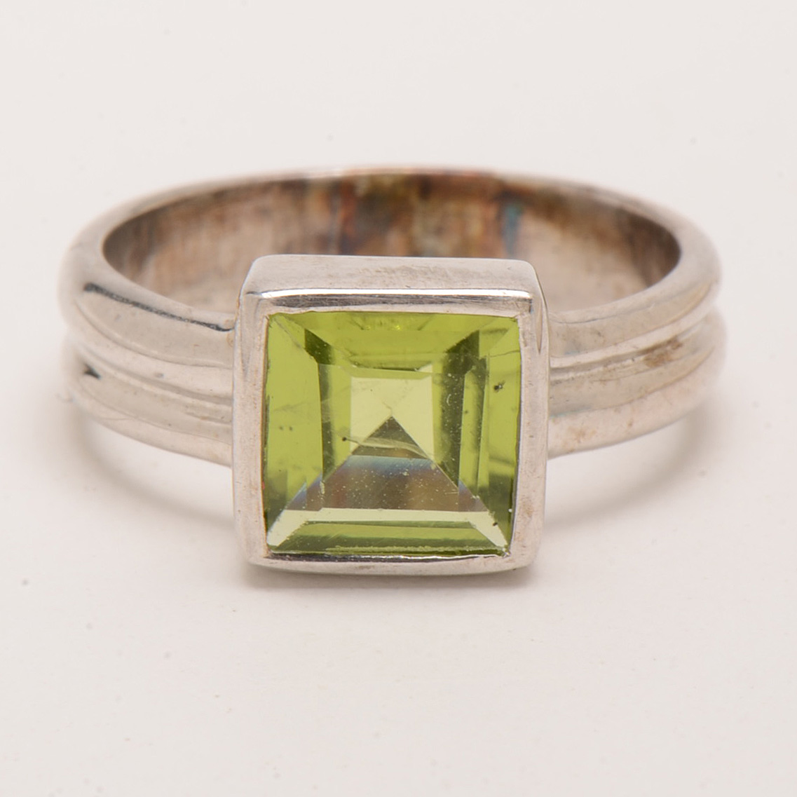 Three Contemporary Sterling Peridot Rings