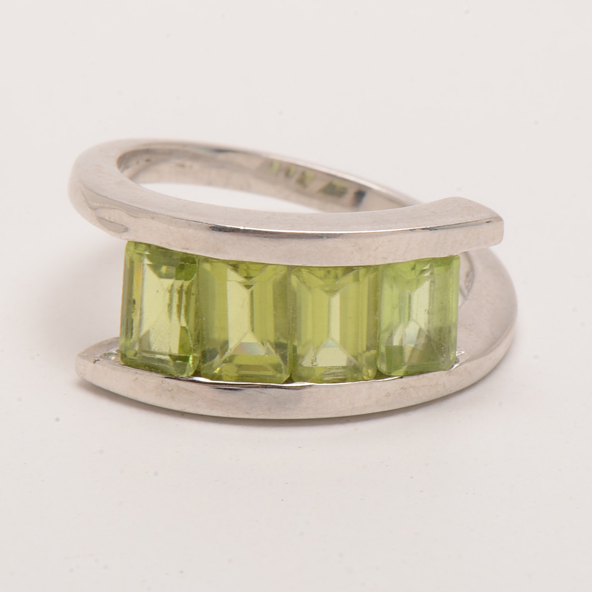 Three Contemporary Sterling Peridot Rings