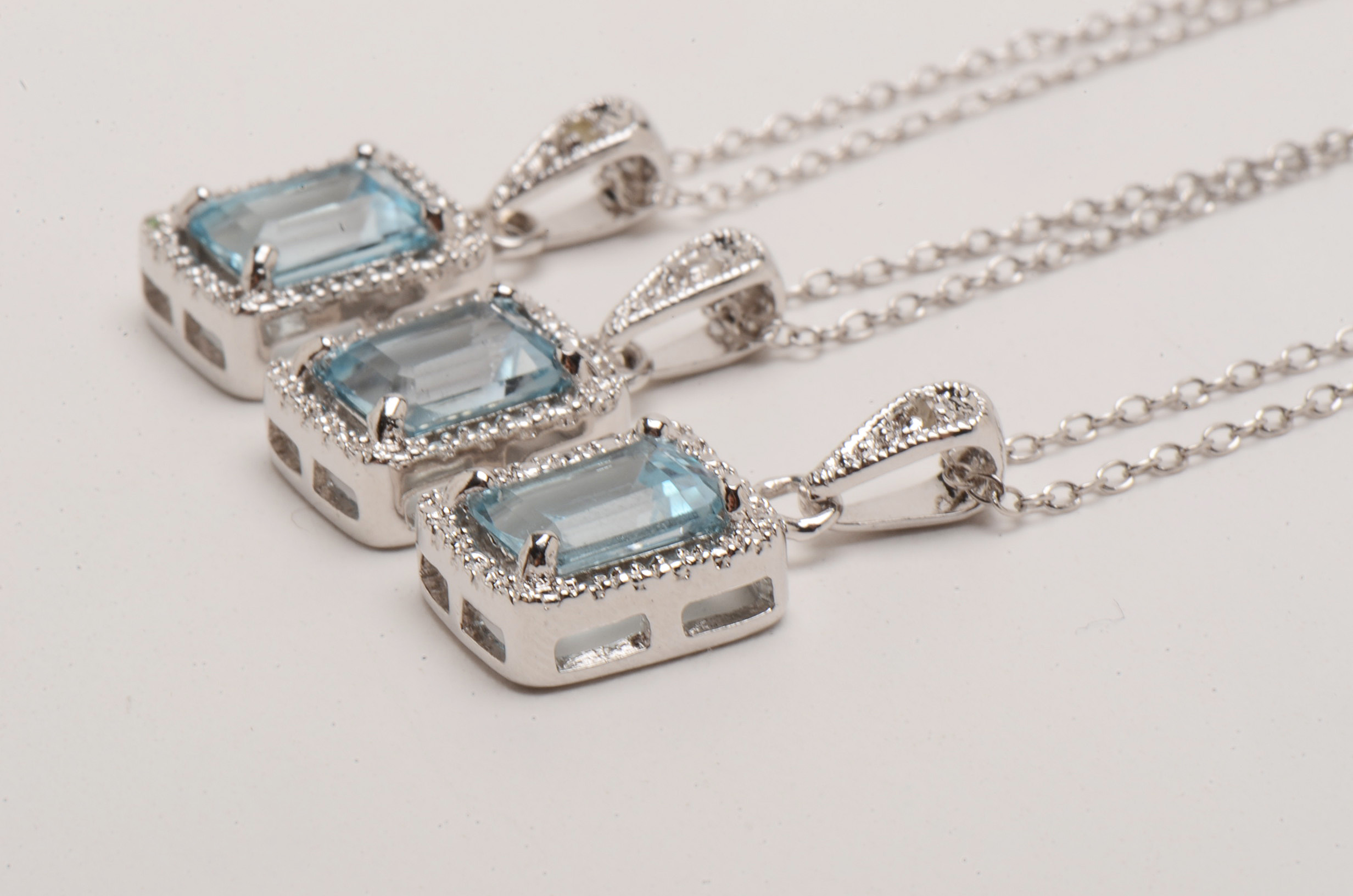 Sterling Blue Topaz and Diamond Necklace and Earring Sets