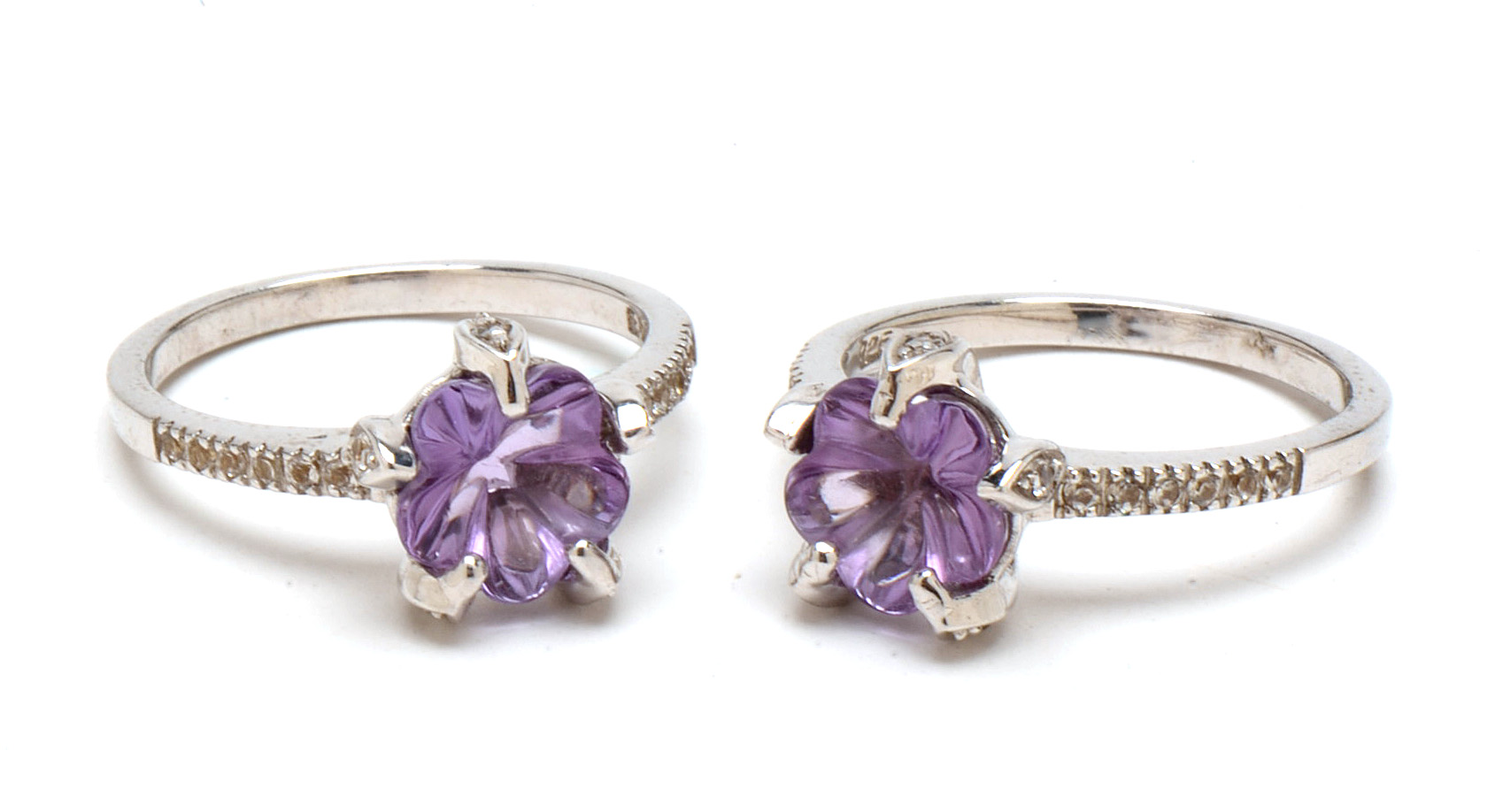 Four Sterling Amethyst Rings with Diamond and Topaz Accents