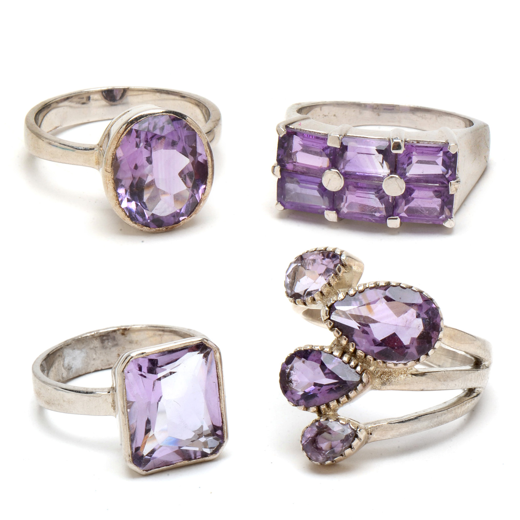 Four Contemporary Sterling Amethyst Rings