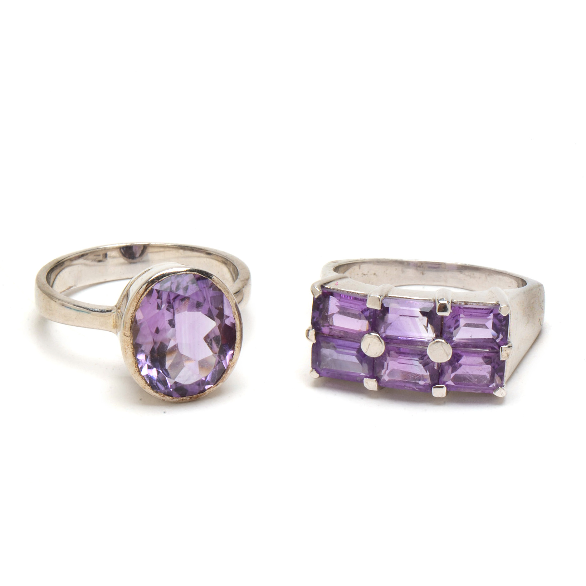 Four Contemporary Sterling Amethyst Rings