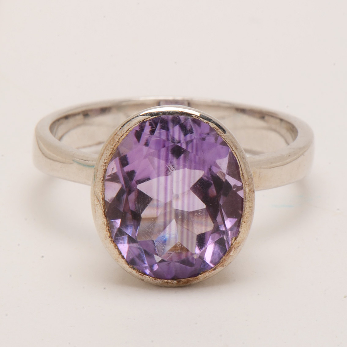 Four Contemporary Sterling Amethyst Rings