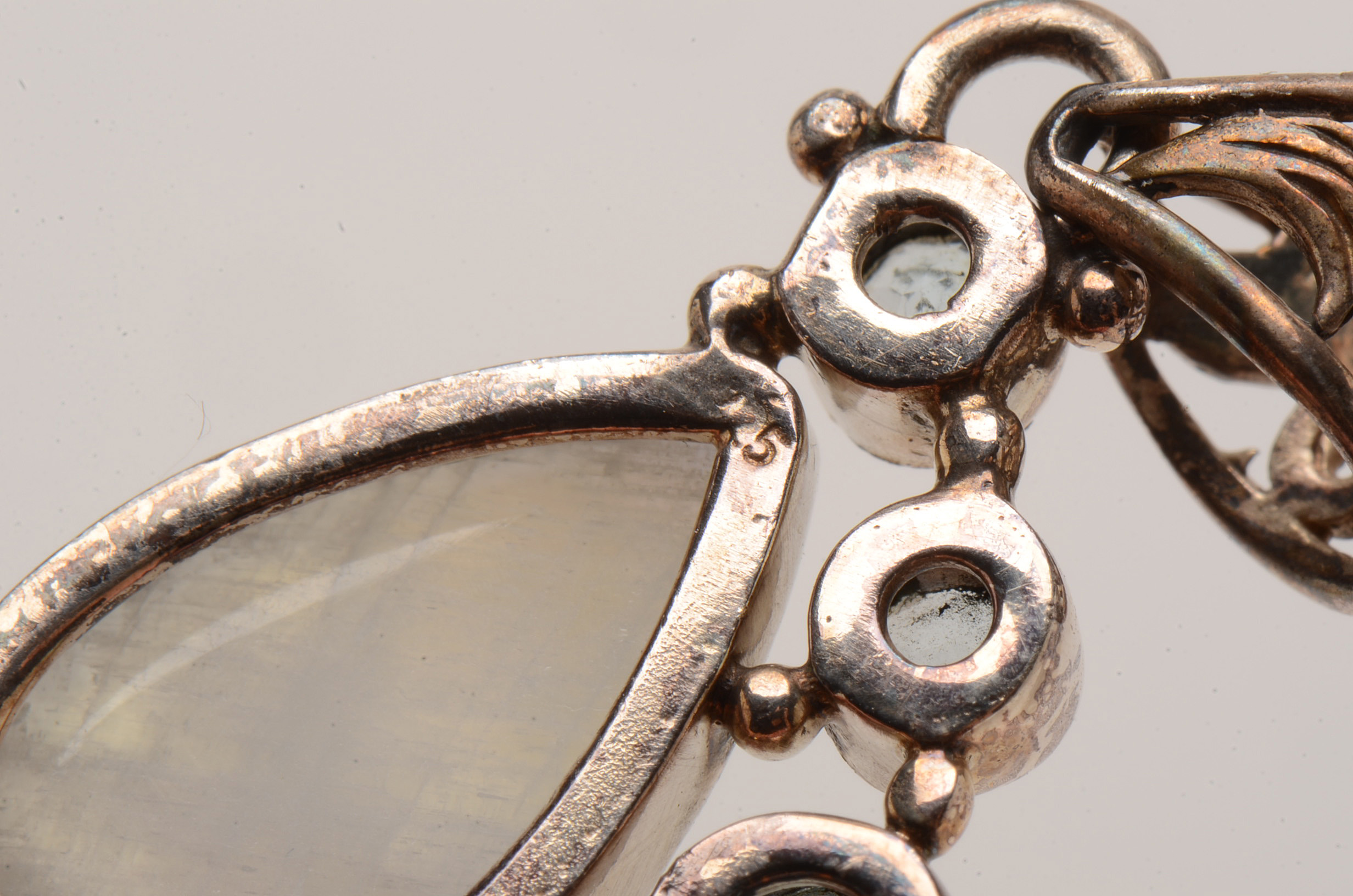 Two Sterling Rainbow Moonstone and Topaz Pendants