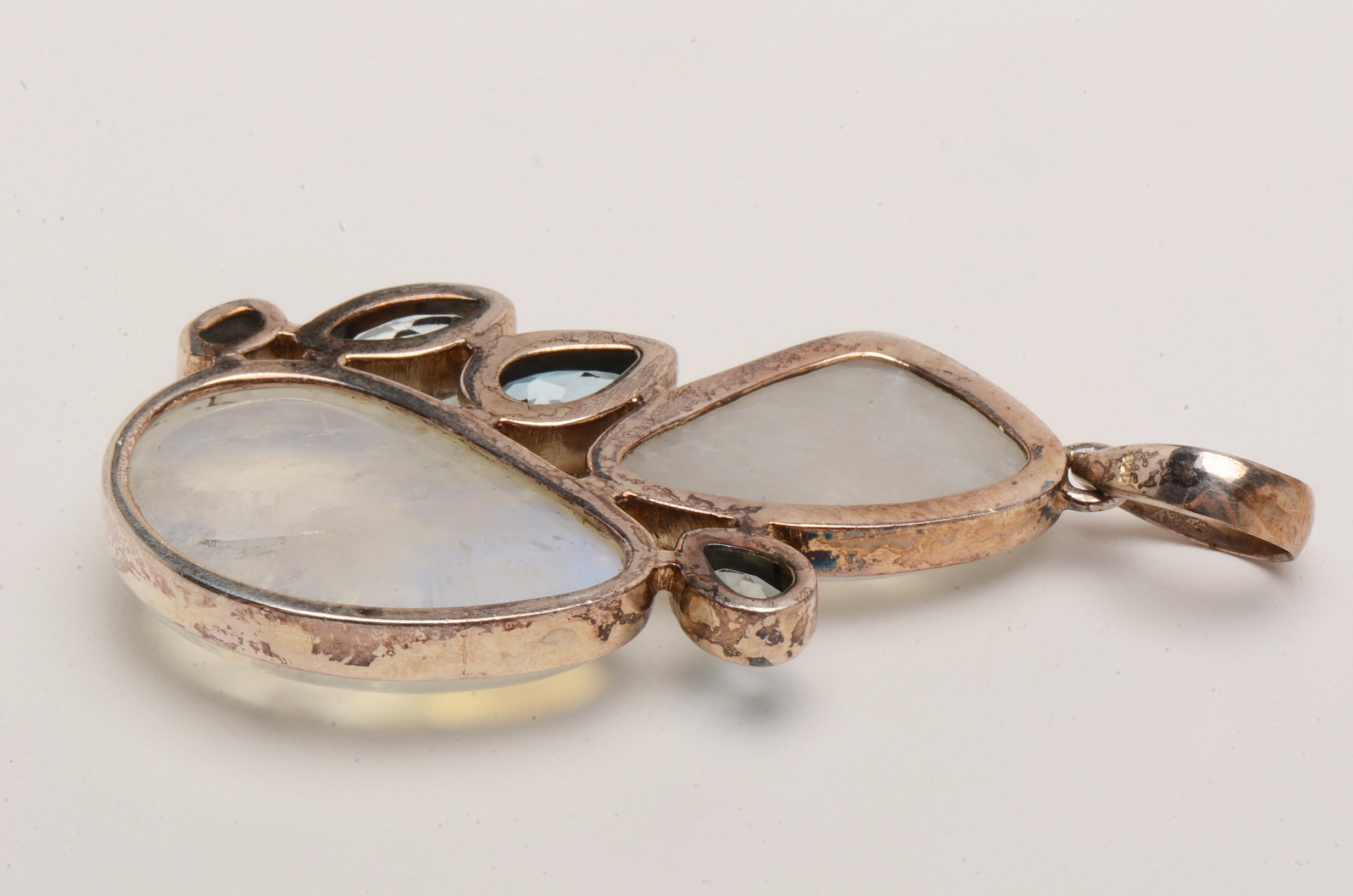 Two Sterling Rainbow Moonstone and Topaz Pendants