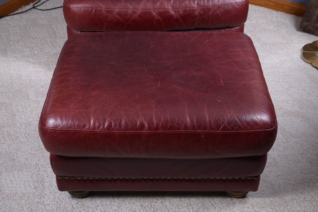 Natuzzi Burgundy Leather Armchair and Ottoman