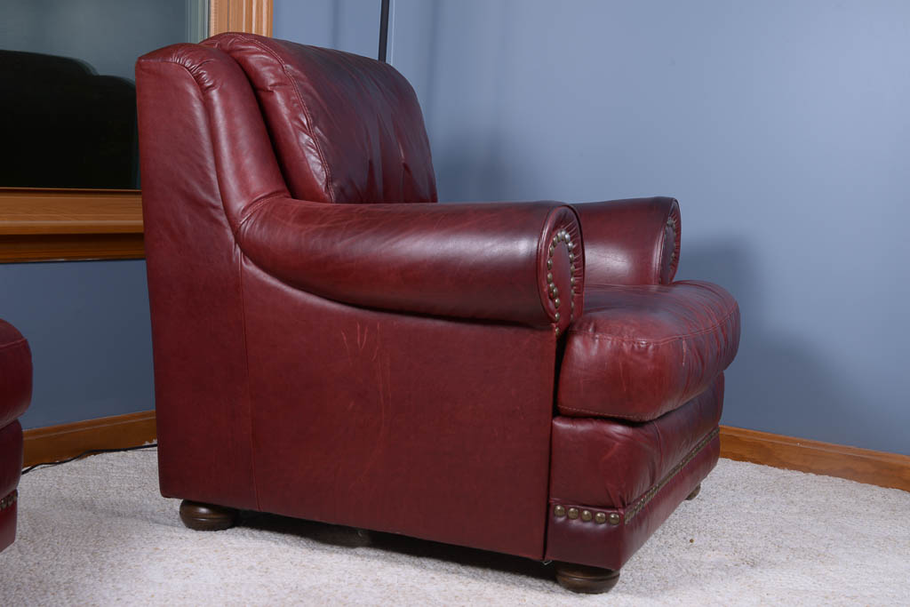Natuzzi Burgundy Leather Armchair and Ottoman
