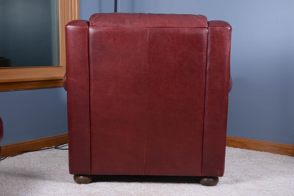 Natuzzi Burgundy Leather Armchair and Ottoman