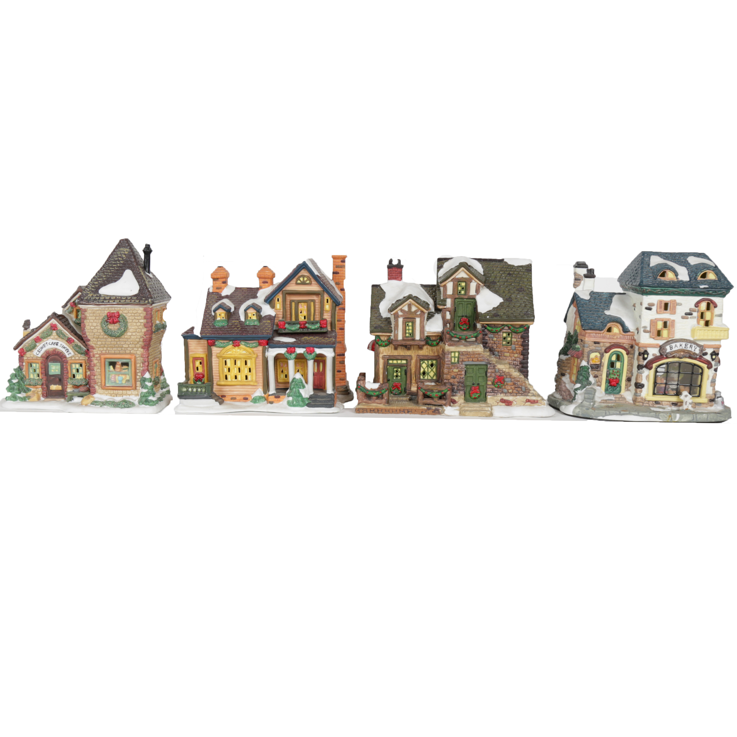 Collection of "Santa's Workbench Collection" Illuminated Houses