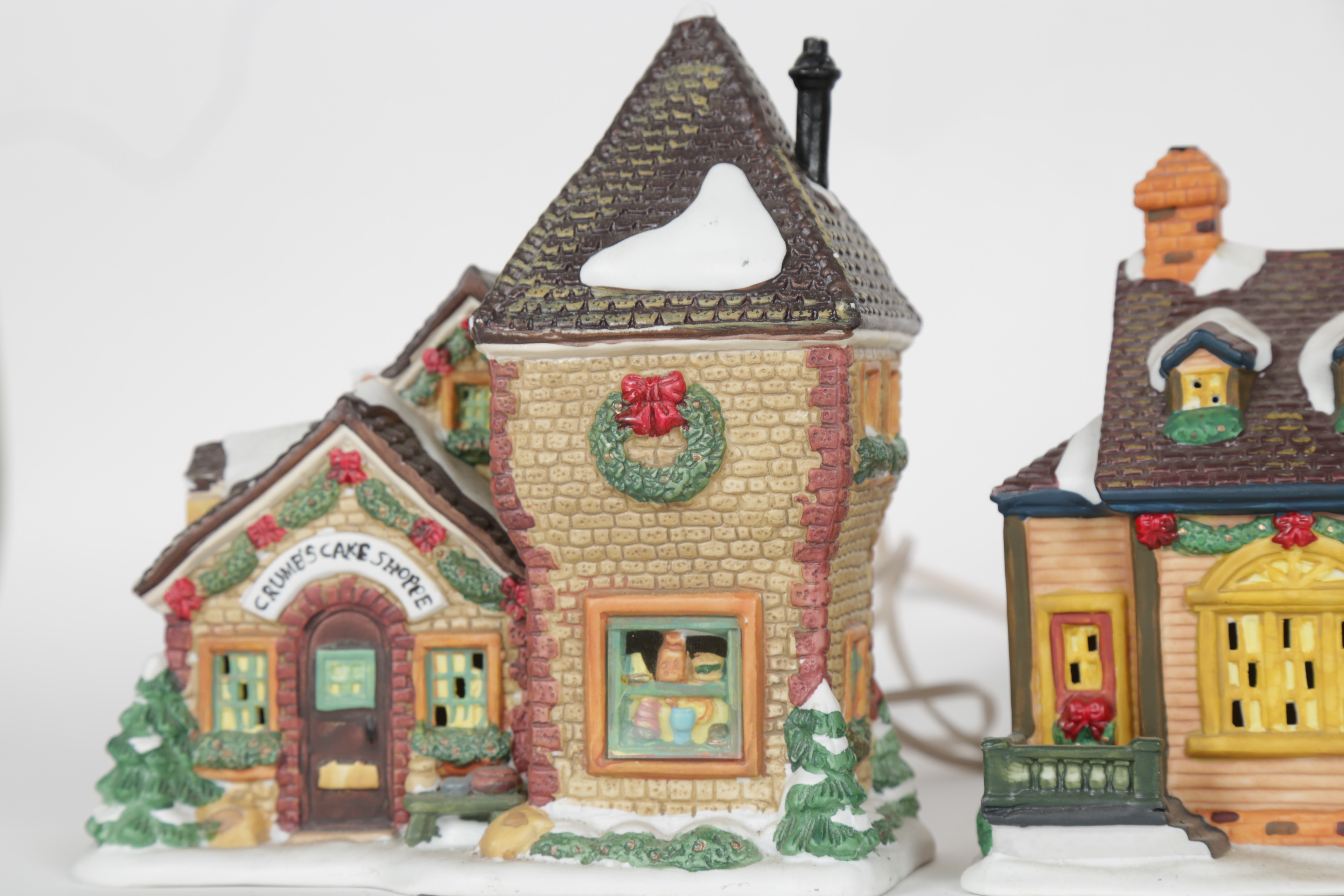 Collection of "Santa's Workbench Collection" Illuminated Houses